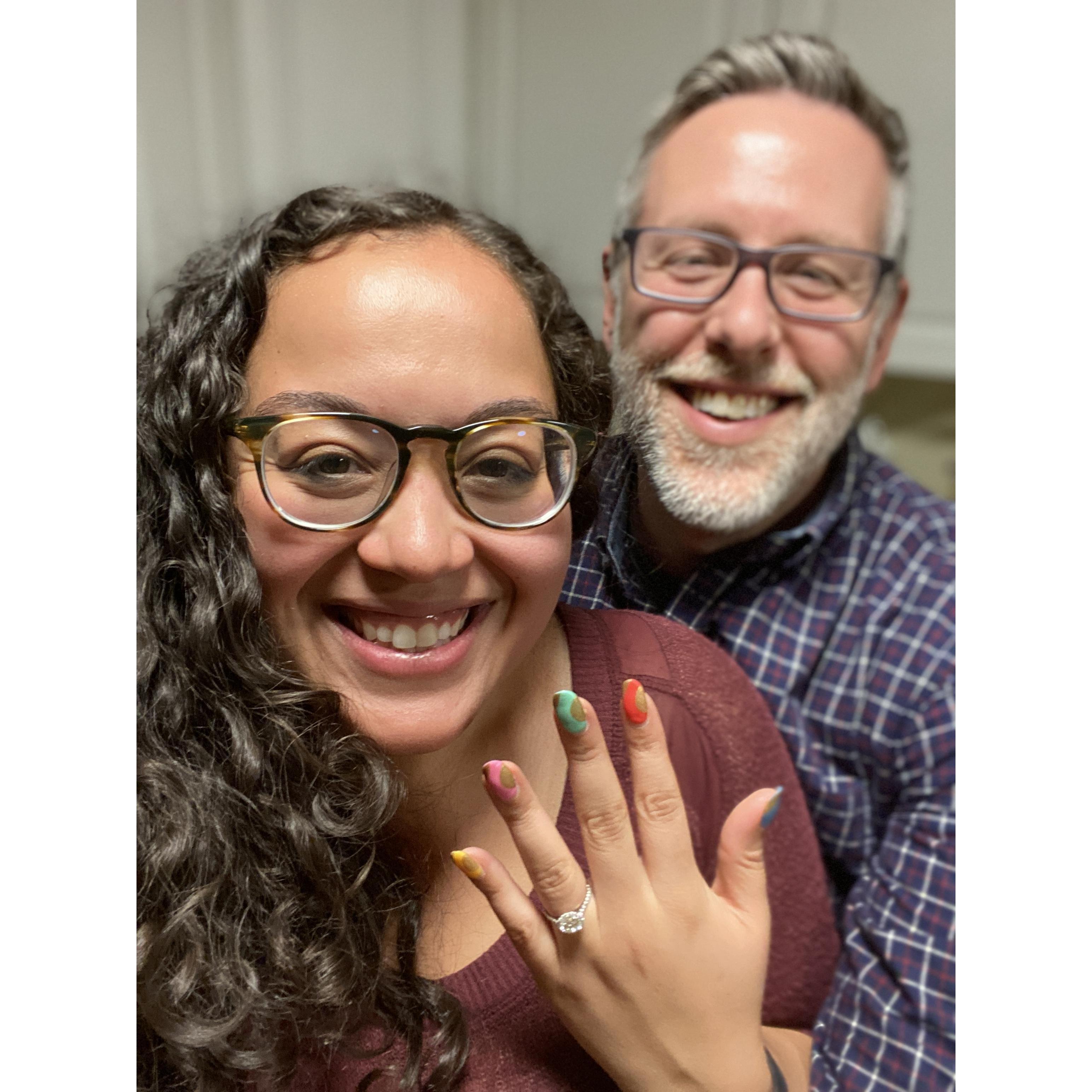 Engaged! (Rosy cheeked appearance on both due to fever from COVID)