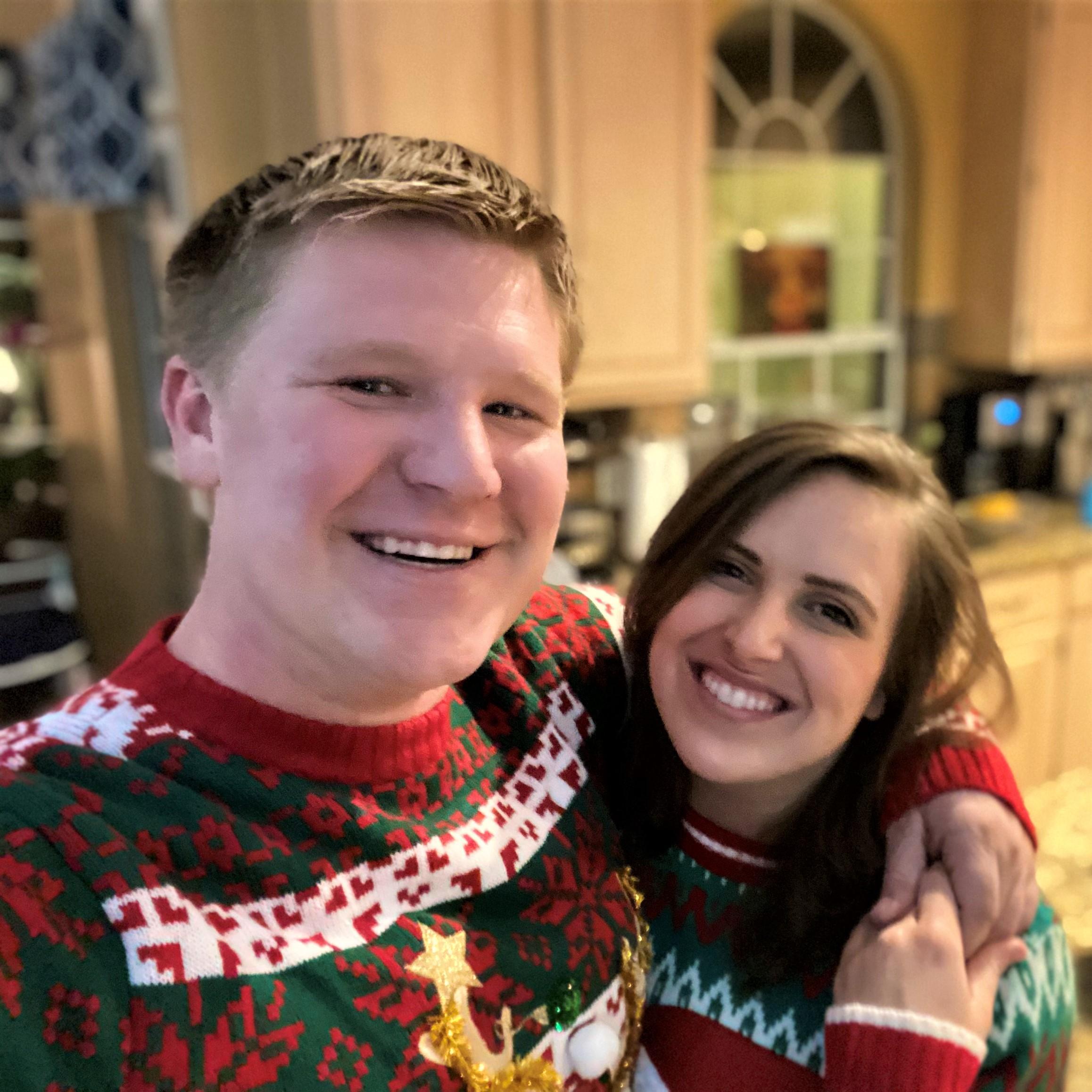 Our lovely Christmas sweaters. You can't see it but Morgan's has a llama and Jennifer's has a sloth both with cup holder built in.