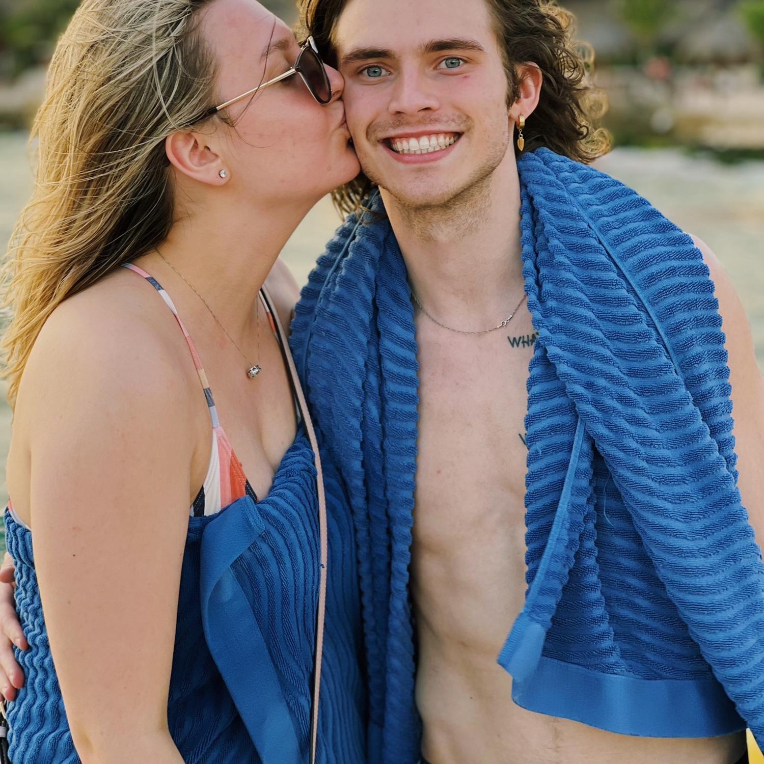 Us after swimming with dolphins in Costa Maya. December 2022