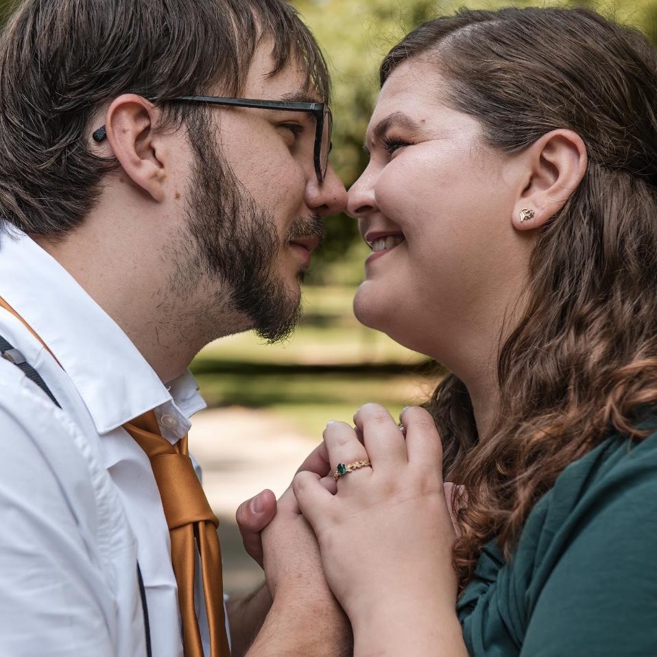 David has such beautiful brown eyes, and he’s looking at my eyeliner because when I smile my eyes disappear lol.