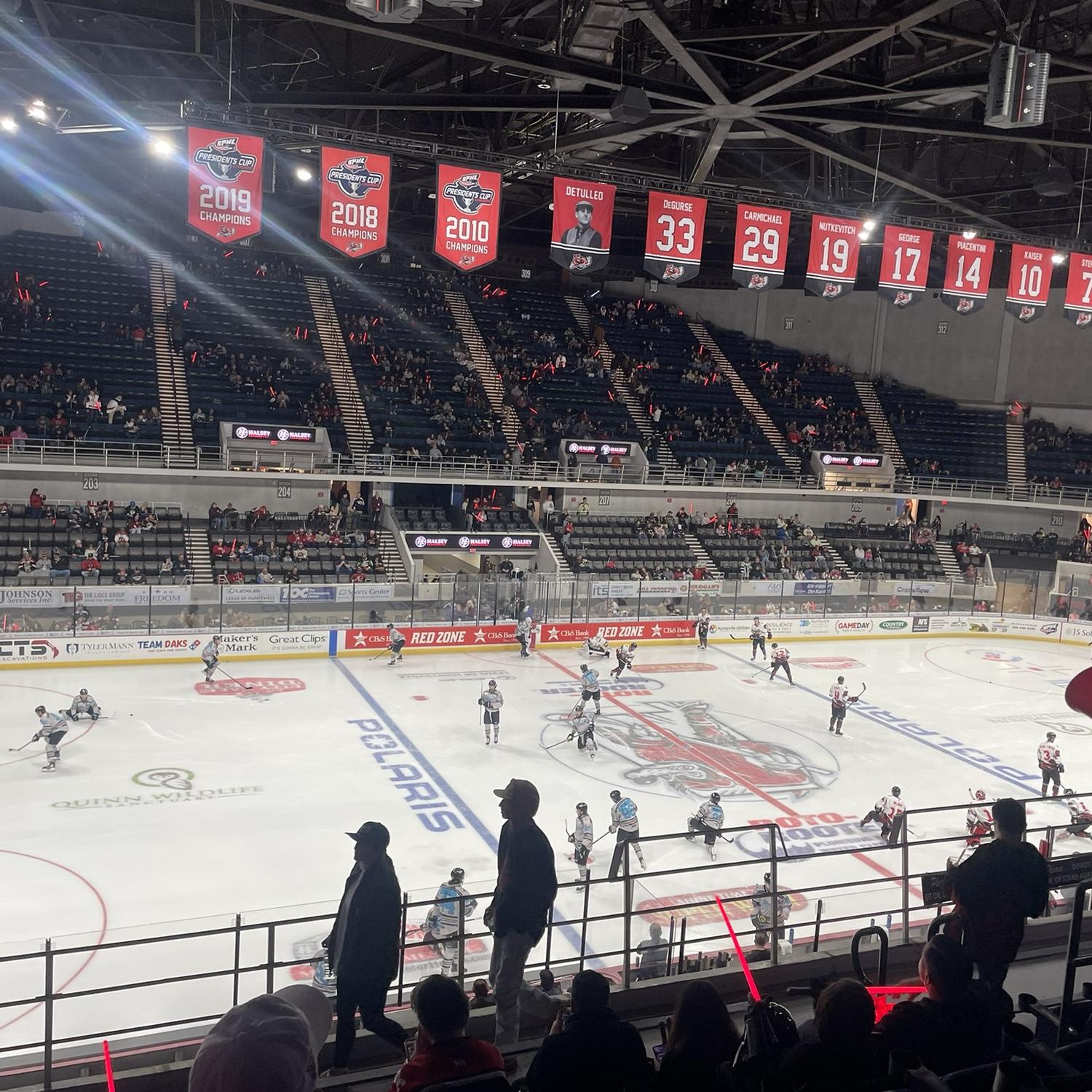 Benjamin took Nina to watch hockey game, it was fun and loud!