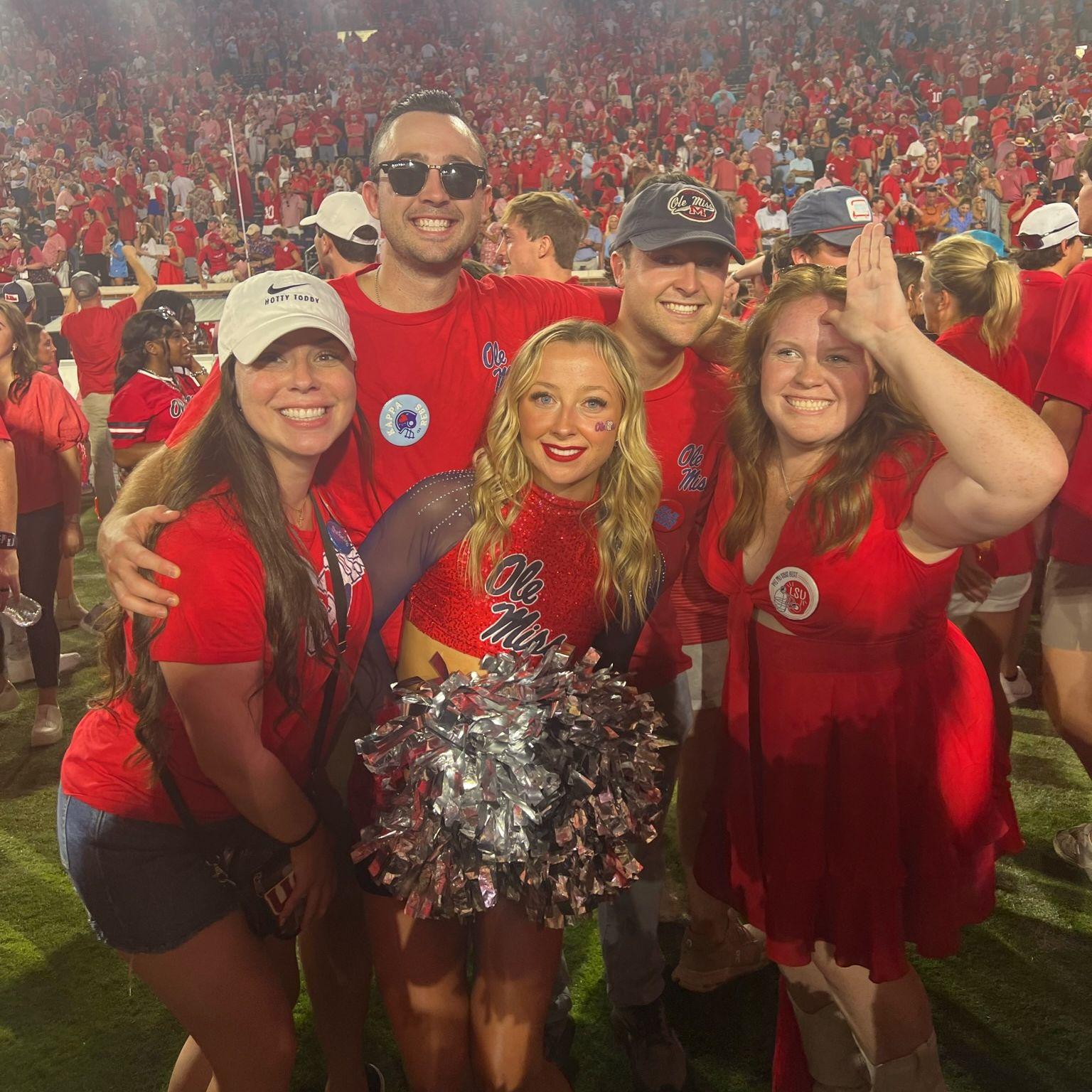 Josh, Megan, and Katie stormed the field with us after the Ole Miss Game!!