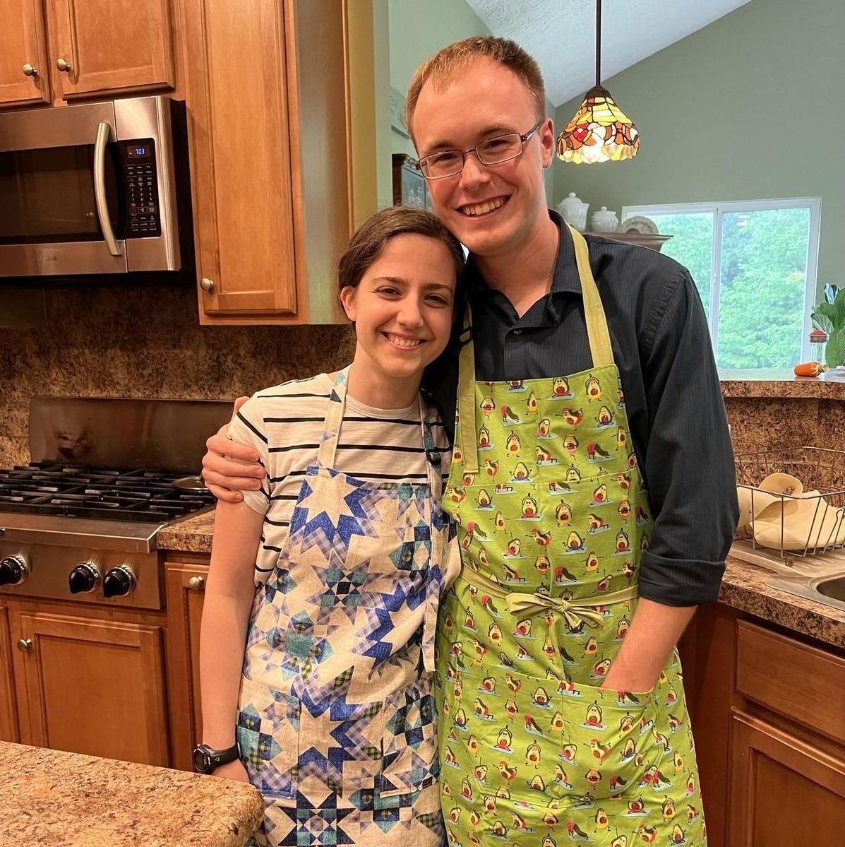 Cooking buddies, with wonderful handmade aprons!