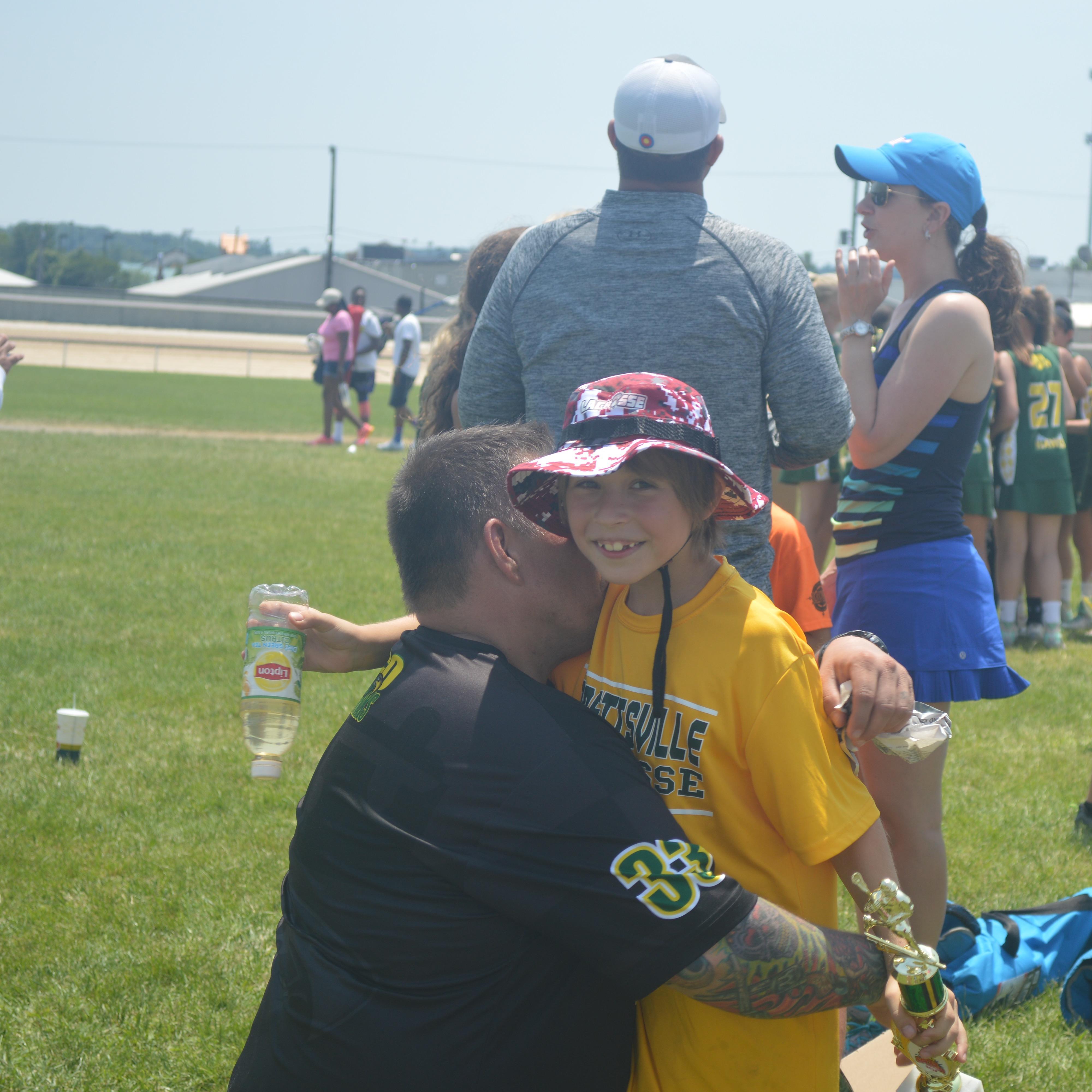The award presentation after their first Lacrosse Tournament.