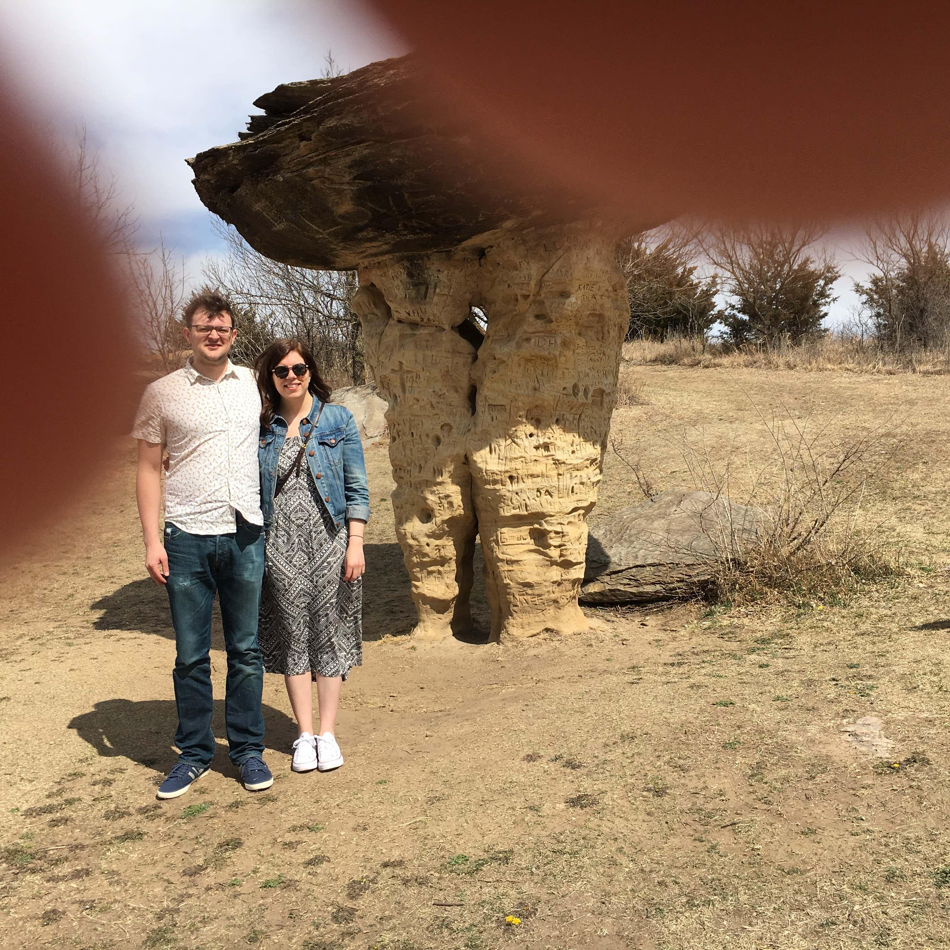 We laugh a lot about this photo a stranger tried to take of us with the "mushroom rock," on Katie's first visit to Kansas