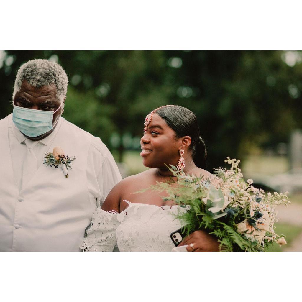 Father of the bride ready to roll her down the aisle!