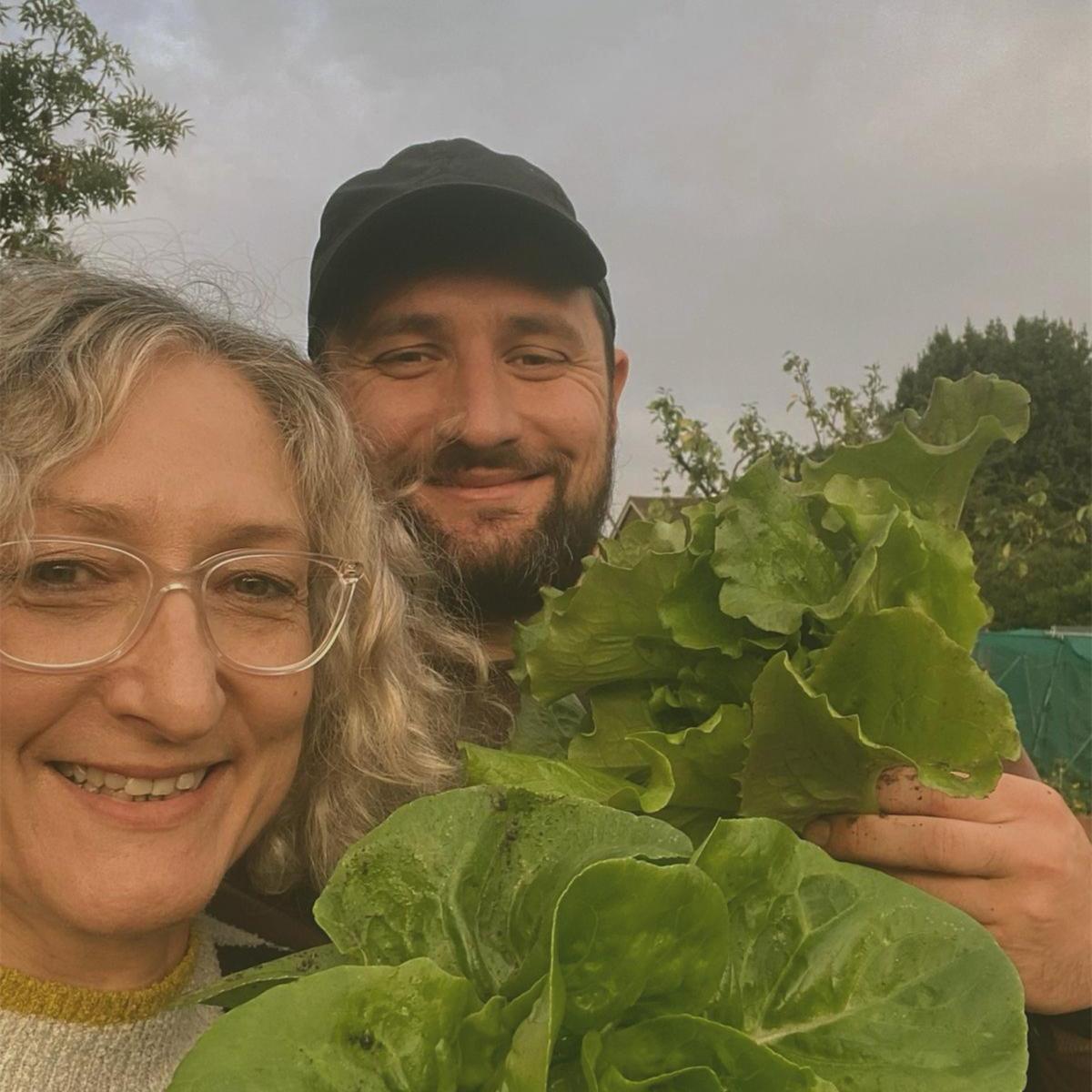 Nick and his Ma proudly showing off the fruits of the Osborn Farm Inc.