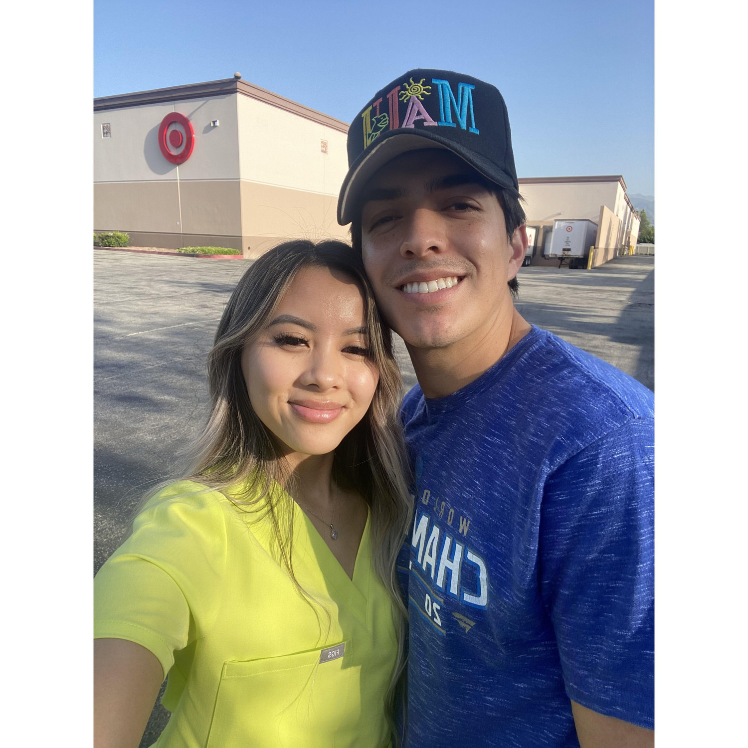 April 5, 2022 - Nathen was the man behind the camera as Michelle decided to pursue social media to document her nursing career! Michelle wanted to take photos behind this Target (lol)