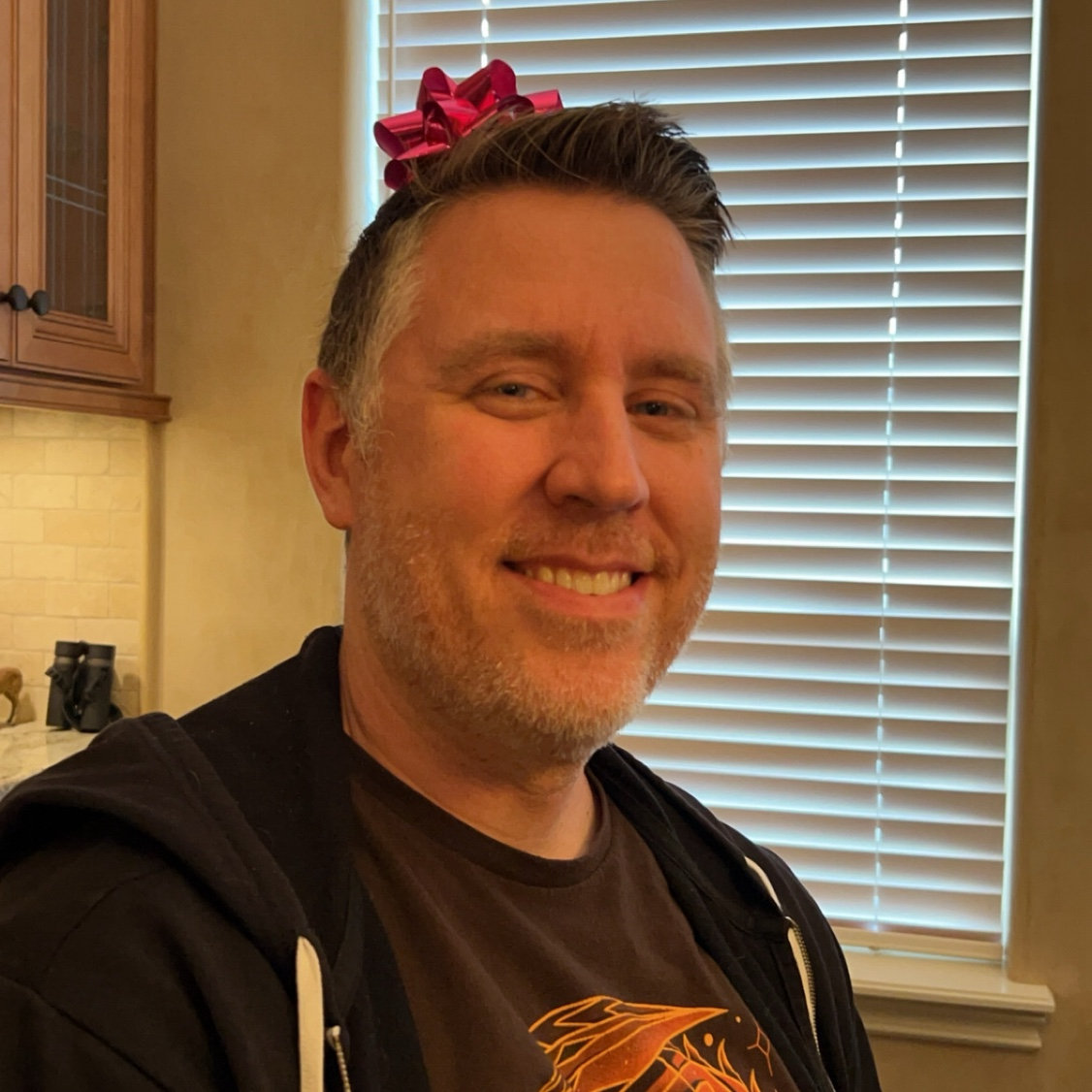 This was not Craig’s birthday, in fact is was basically every one else’s birthday, but if there’s a bow with a sticker on it, Stephanie will put it on his head, and he will let her.