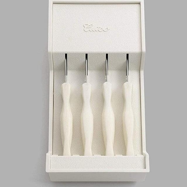 CUTCO Model 1864 set of four White (Pearl) #1759 Table Knives plus #1745 tray........................Knives have 3.4" Double-D serrated edge blades and 5" handles.............Knives are in factory sealed plastic bags.