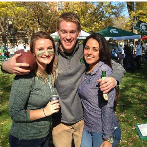 1st Time tailgating together :). Playing corn hall and beer pong with Lauren.