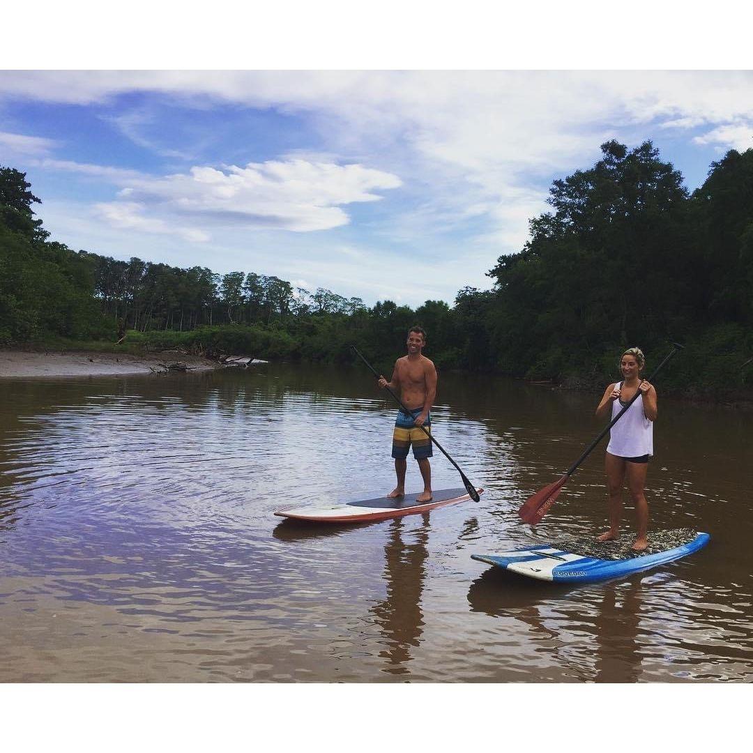 Costa Rica paddle boarding with crocodiles. 