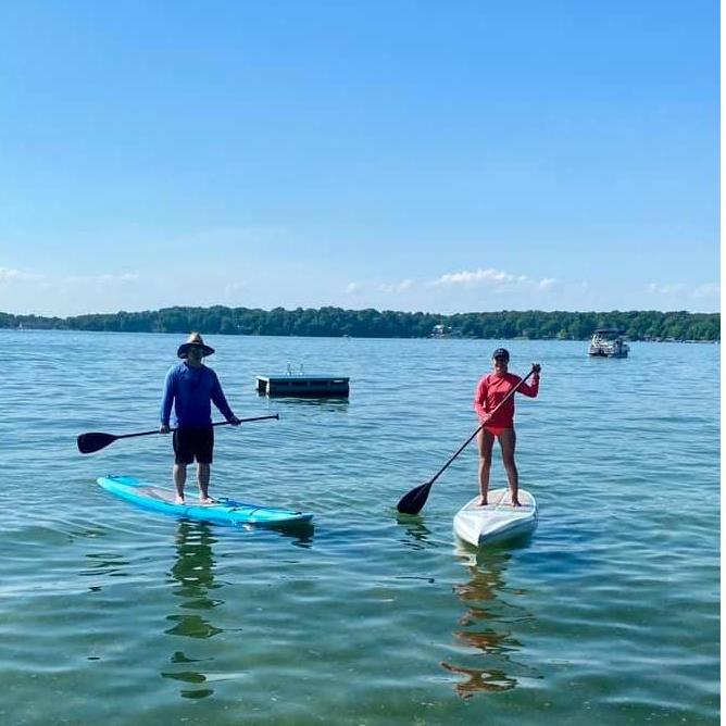 Cory's first-time paddle boarding! Took him some time, but he got the hang of it :)