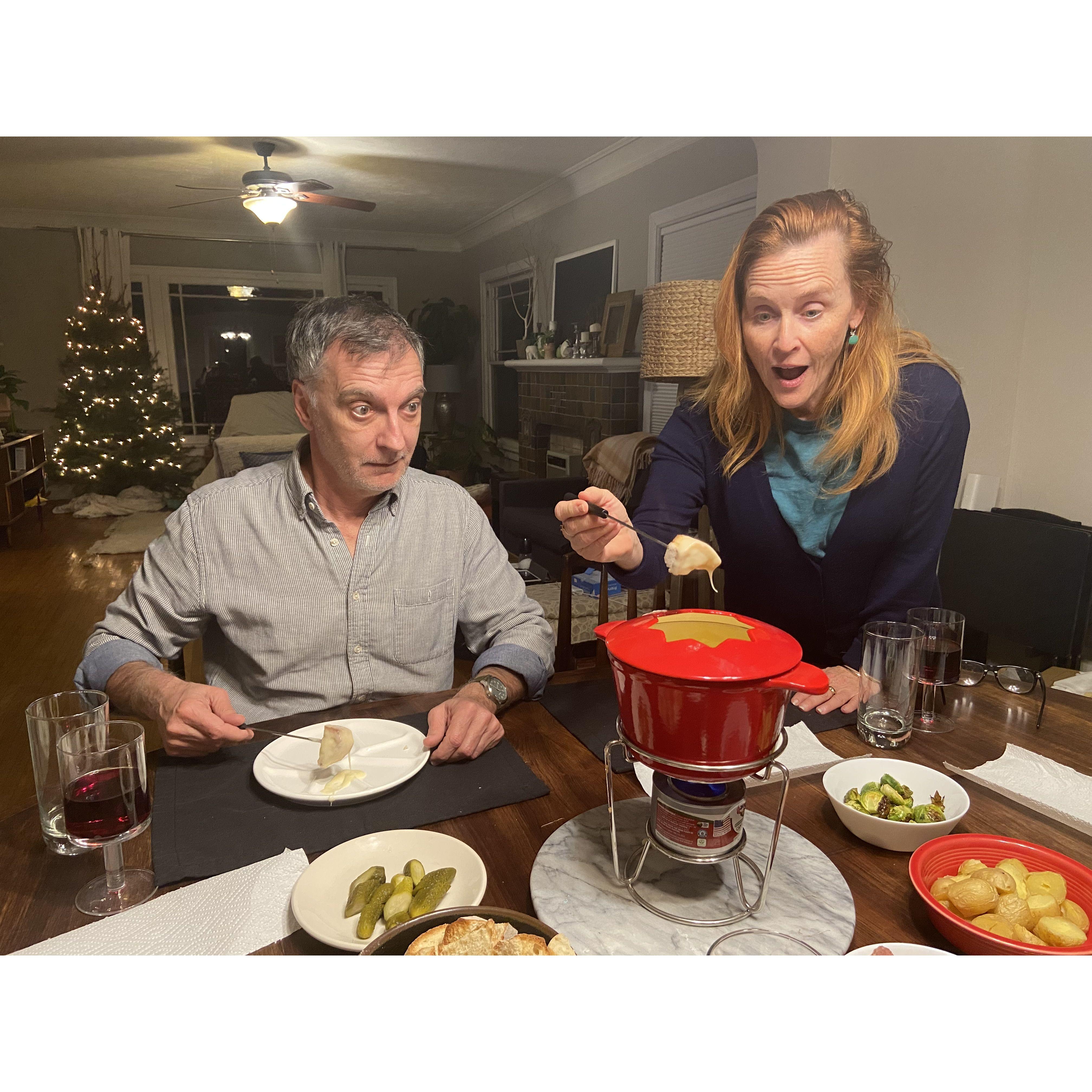 Antoine and Molly Jackson, wedding officiant and cocktail party host, getting overly excited about fondue.