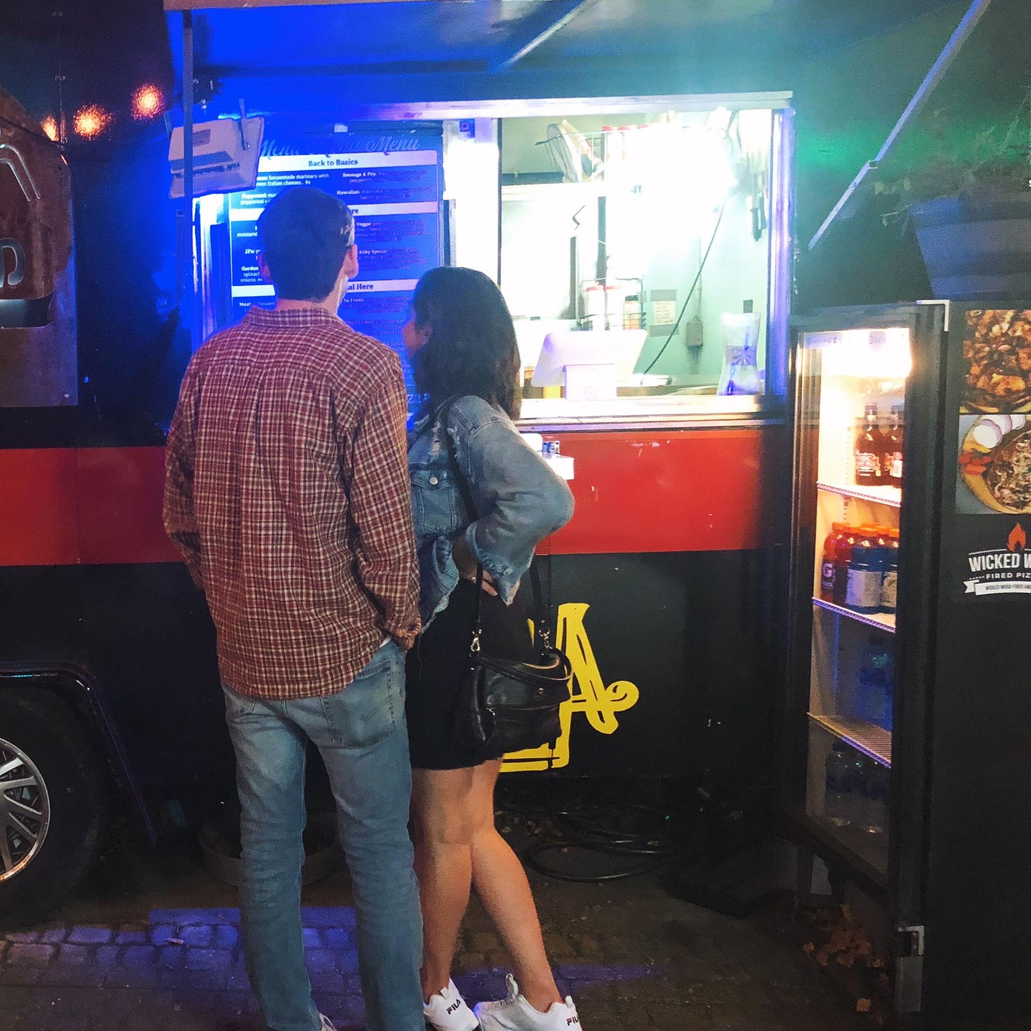 Our first photo together, this food truck burned down a few weeks later