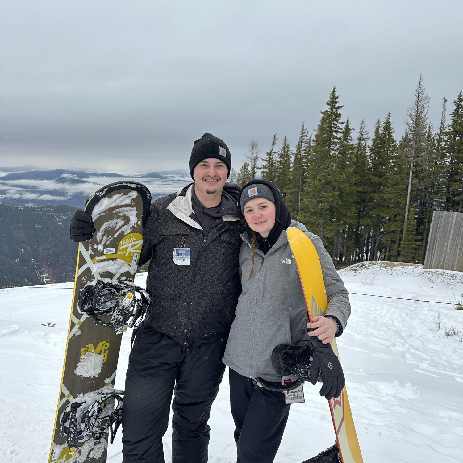 Teaching Taylor how to snowboard
