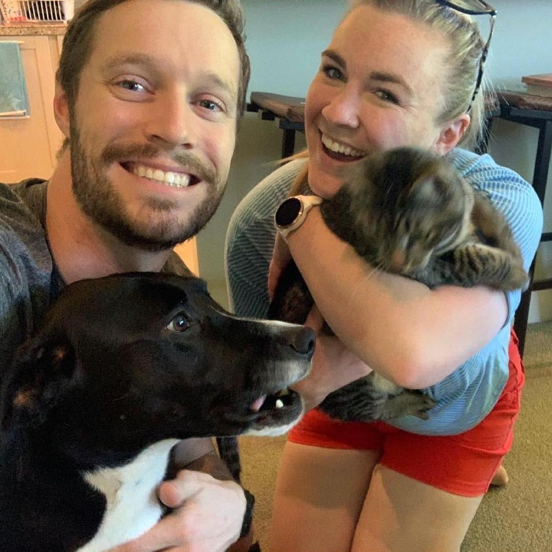 That one time we adopted a cat together. Also, Cooper loves Shuri, this photo is deceiving because he was giving kisses, not trying to bite her.