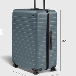 Shop Large & Checked Suitcases in Coast Blue | Away