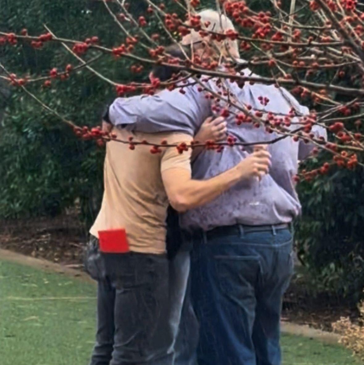 Poppa’s embrace as it poured down raining