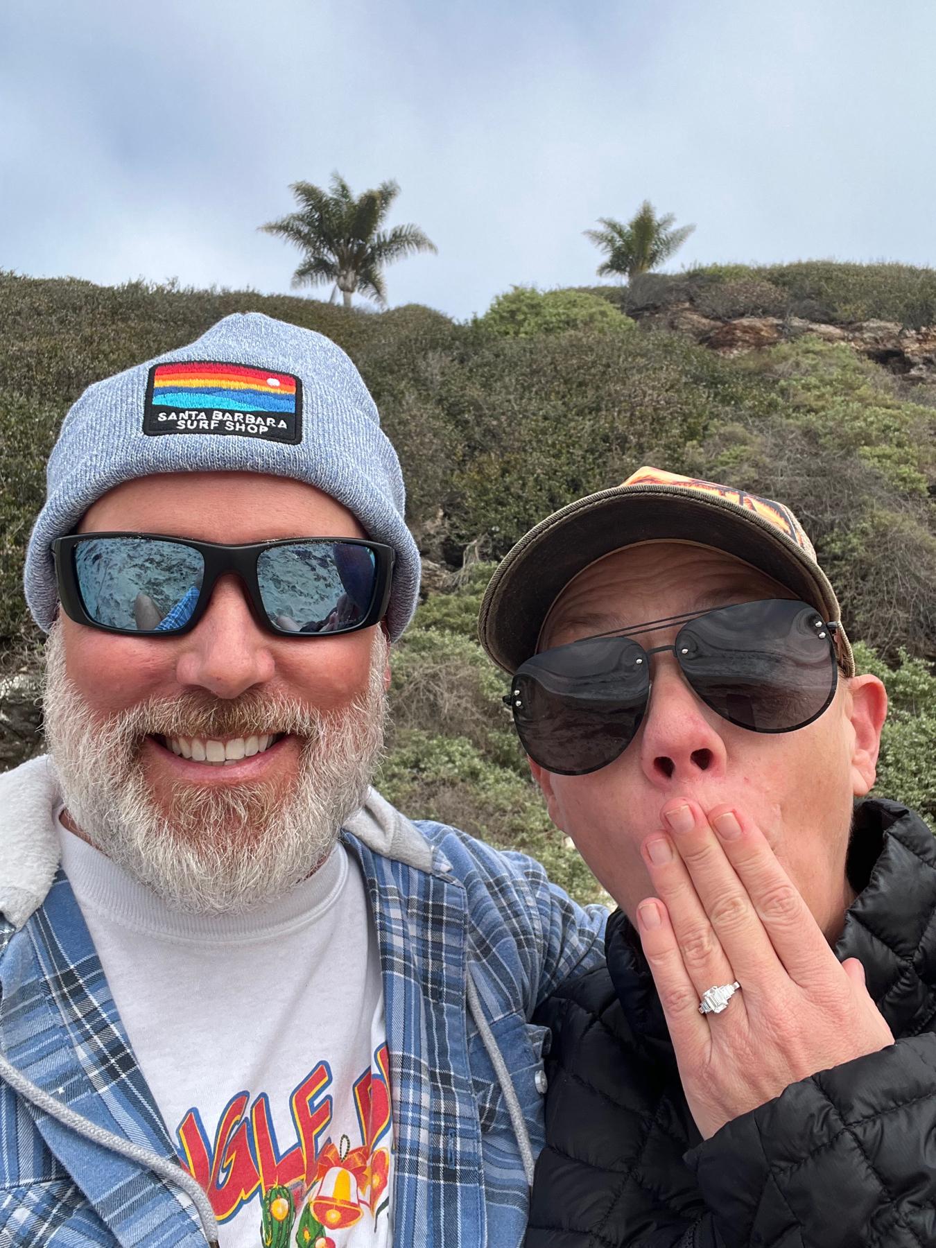 Christmas Day.  Kiraly Beach.  A Santa impostor gets down on one knee and professes his love to his beloved Kati.  She said YES!