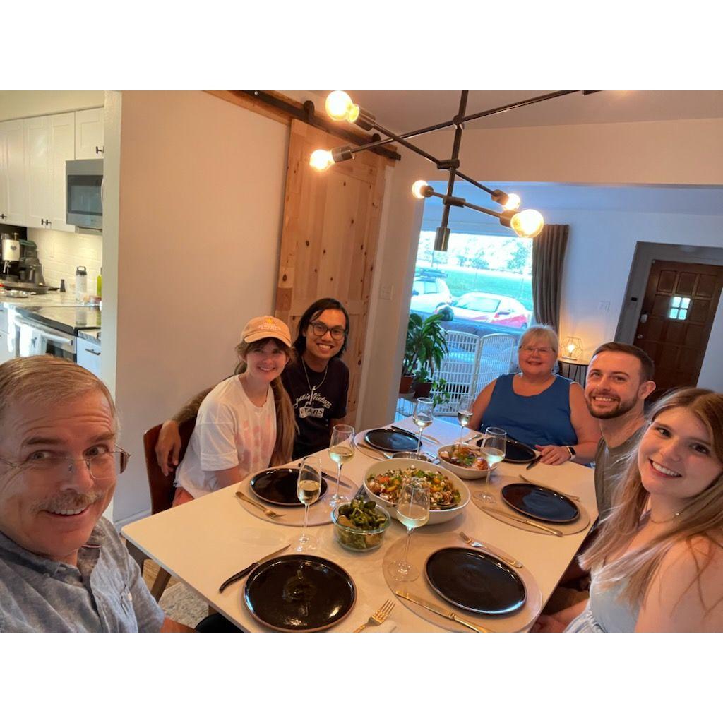 Enjoying a home cooked meal at Roslyn and Andre's!