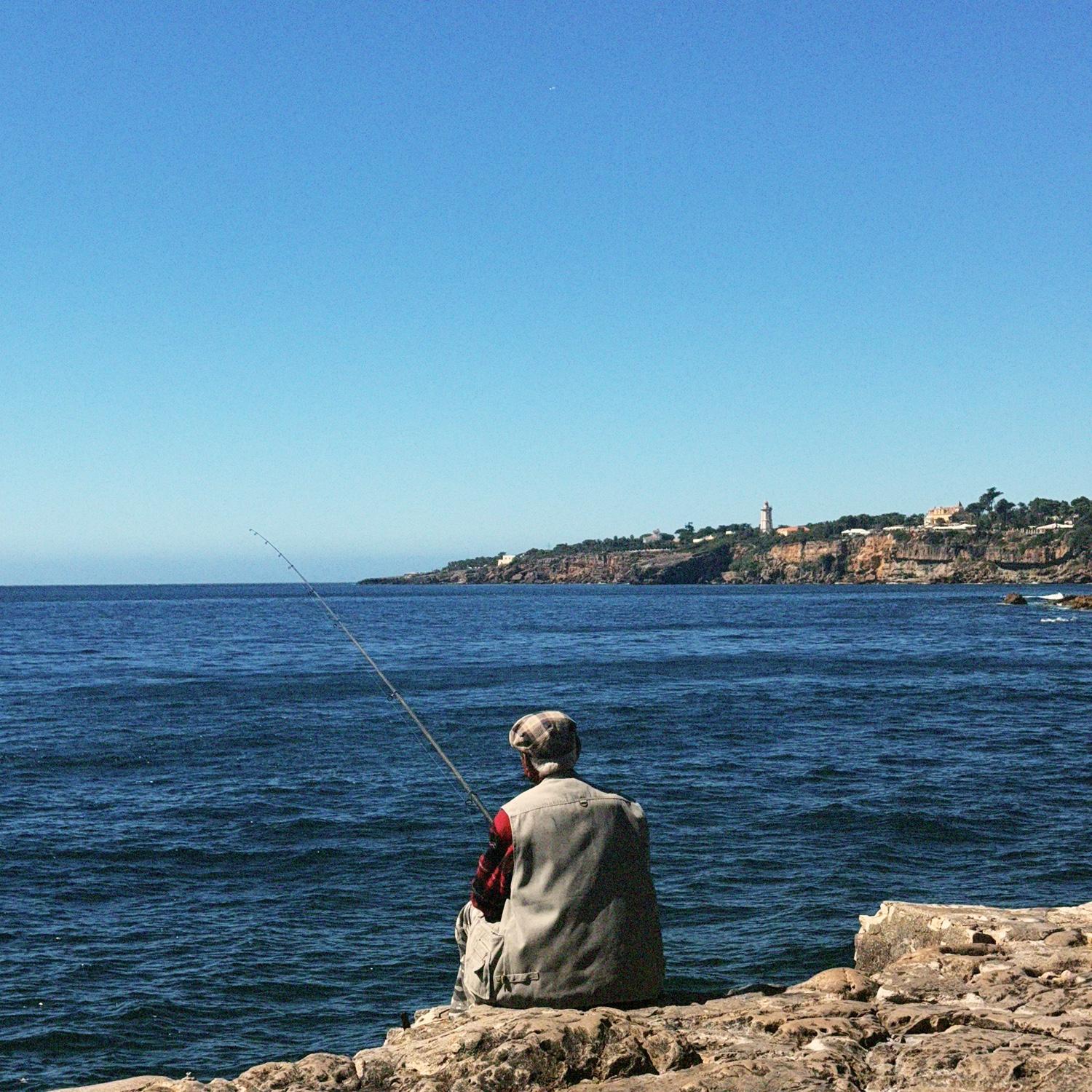 Our favorite little fisherman we saw casting lines in Cascais.