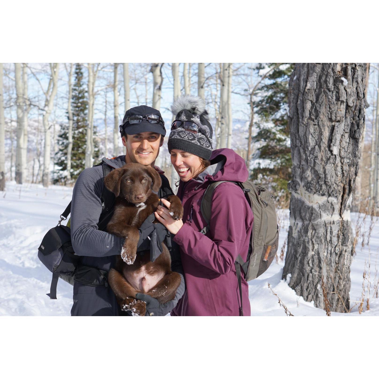 Ask anyone and one of our favorite things to do is hang with our pup 'Beacon'. Here is a shot of us in Steamboat after he severely overate...