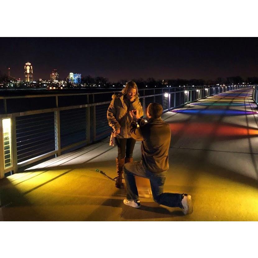 Cory brought the proposal back to one of our favorite spots...Gray's Lake. The bridge is beautiful and has the DM skyline in the background. It is US in a nutshell. Jan 8, 2018.