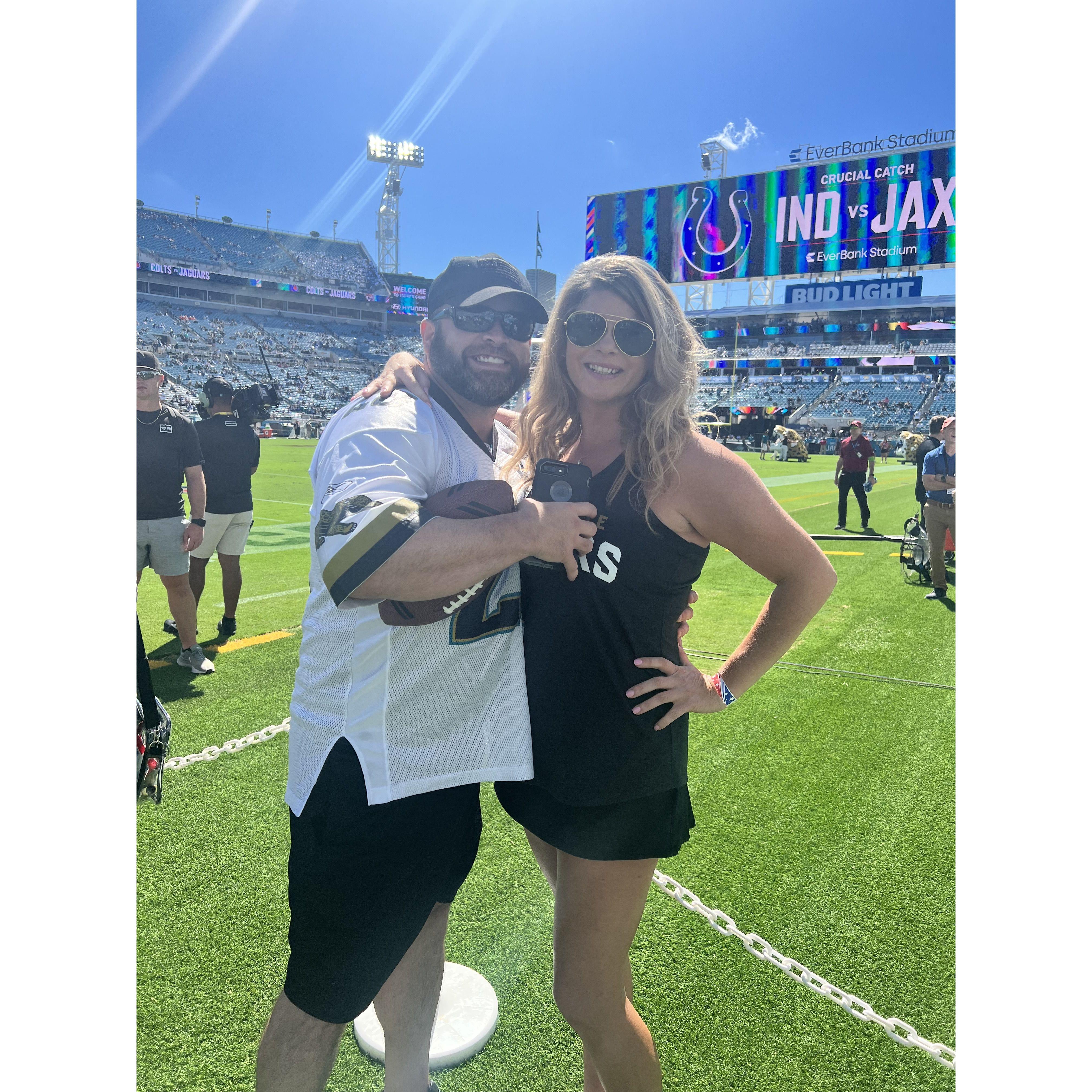 On the field at the Jaguars game, thanks to the "Kick-Off Kid," Madden Lai!