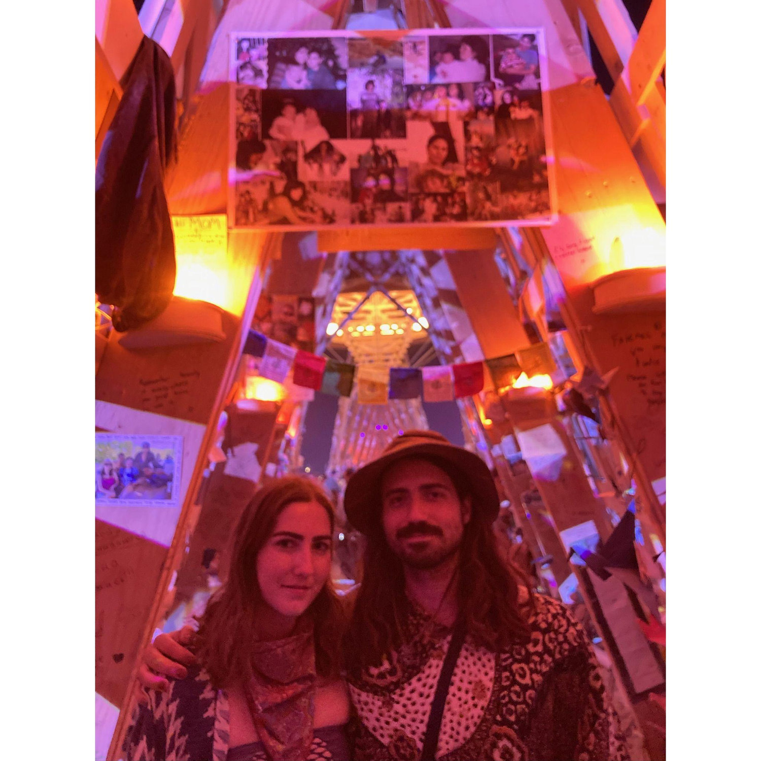 Stunning memorial for Jordan's mom Marina setup in the Temple at Burning Man. They made a charcuterie board and sipped on red wine to celebrate her in this spot.