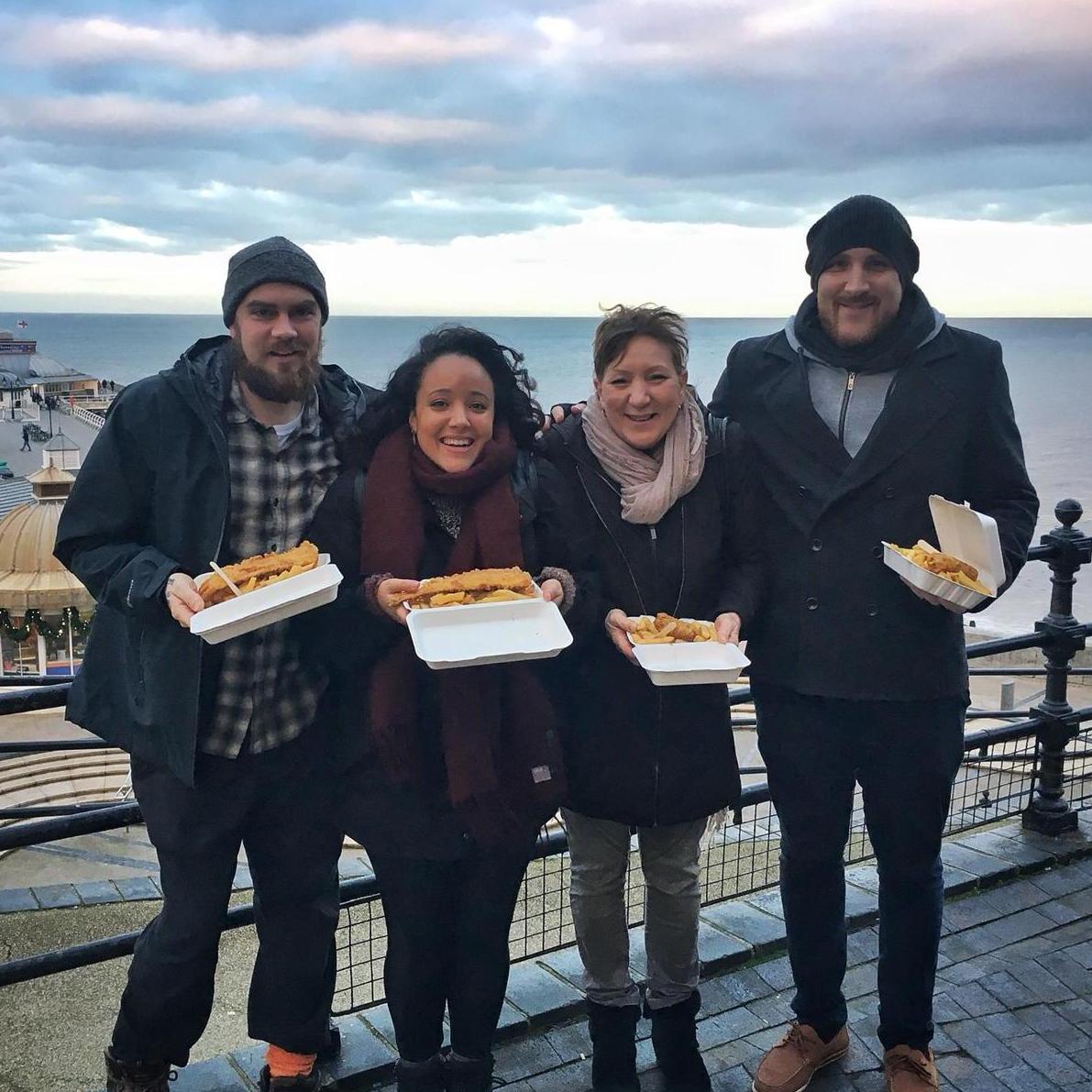 Enjoying fish n' chips in the seaside town of Cromer in England with Nathan's mom and brother.