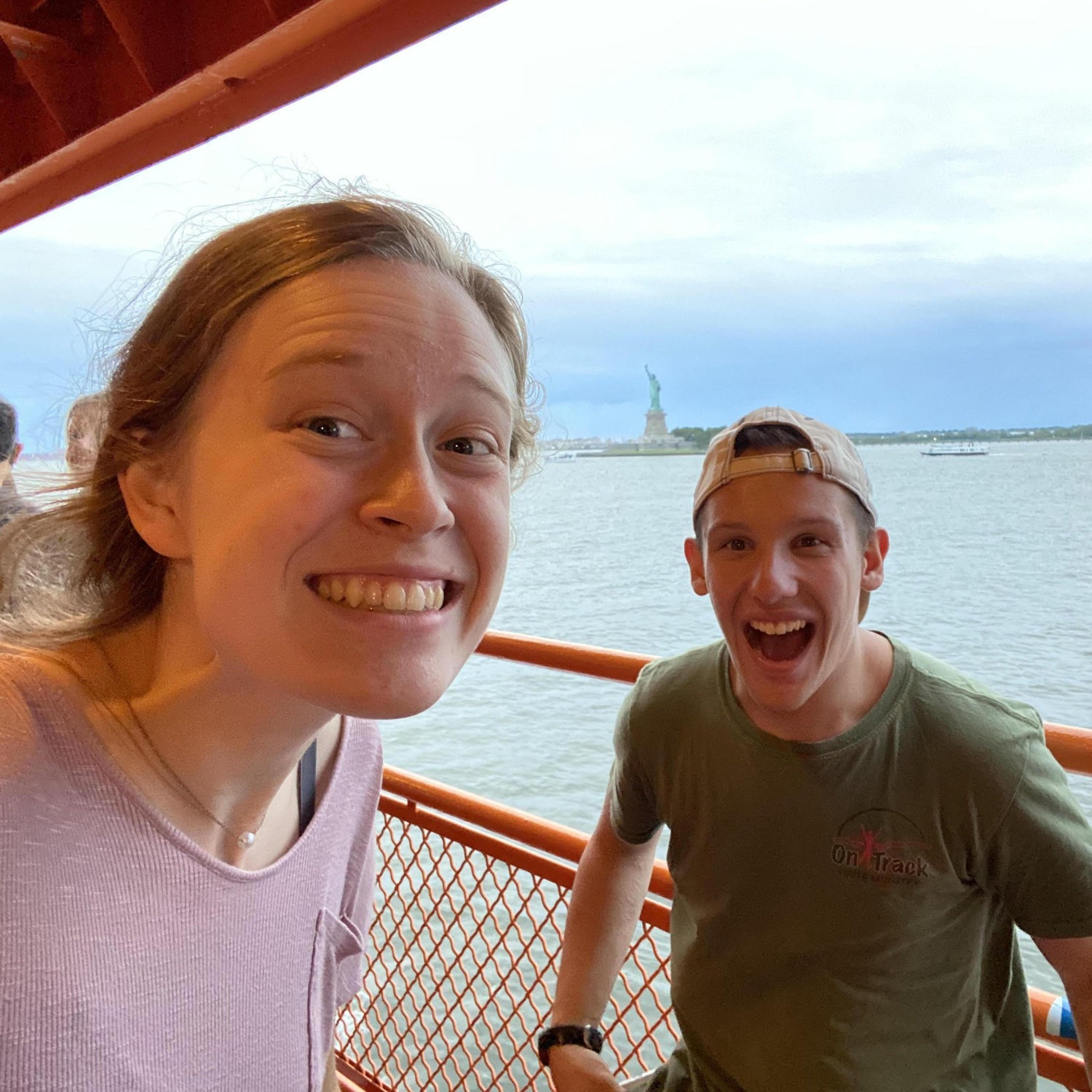 Group trip to NYC. This is us on the ferry with the Statue of Liberty.