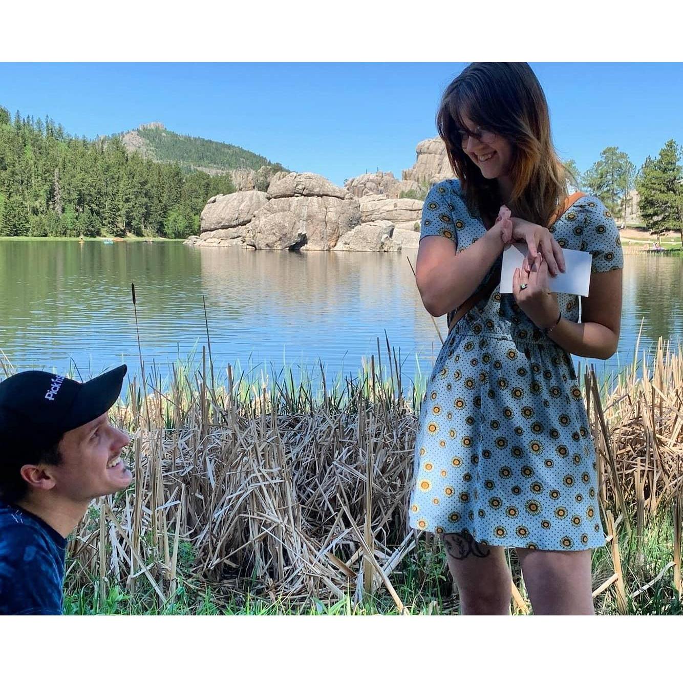 Melody's first words after Joe asked her to marry him were "it's another opal!" Needless to say, he picked the perfect ring. ;)