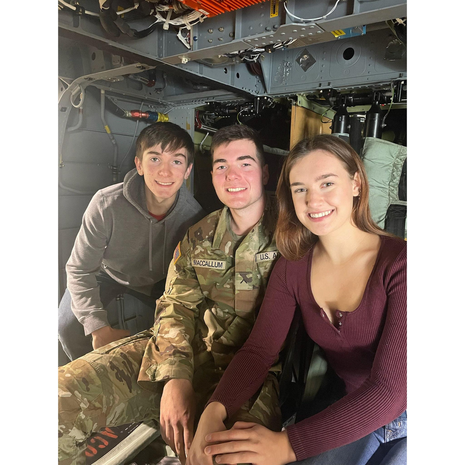 Lacey, Evan, and Blake in a Black Hawk helecopter - Evan was showing us around during his last weekend of AIT