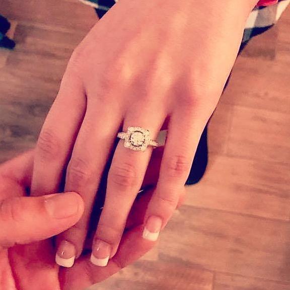 This was right after Criss proposed and I said 'Yes!'. He surprised me by asking at my graduation party, with our family and close friends there. It was a special night both of us will always cherish.