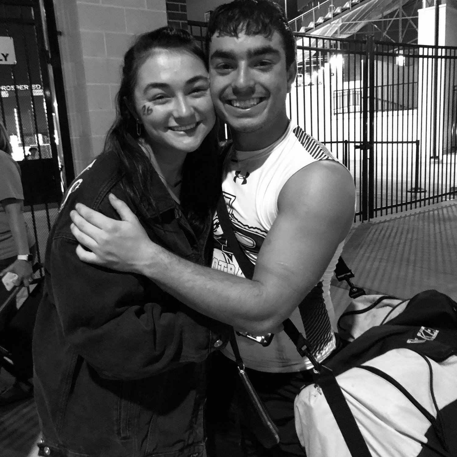 Amandalynn still loving Marco even when he is sweaty & lost his football game!