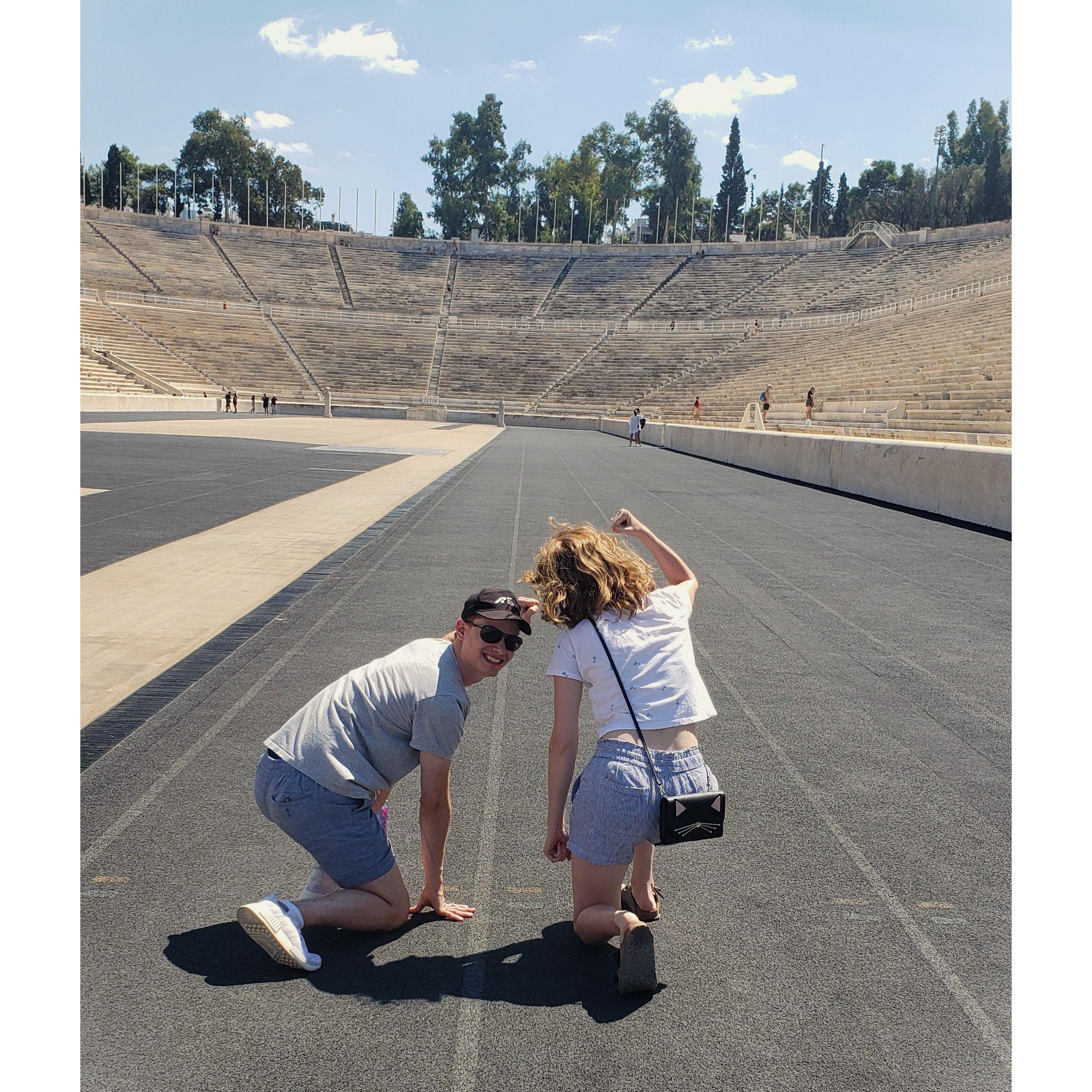 Racing each other at the Greek Panathenaic Stadium in Athens, Greece