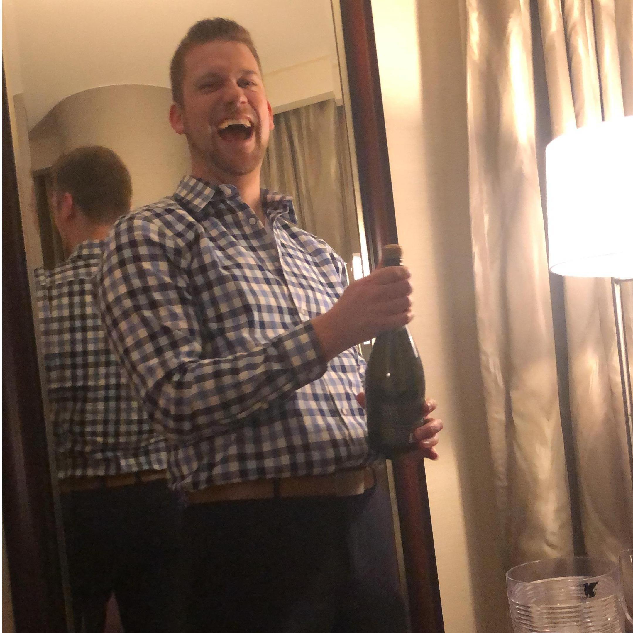 Poppin' champagne after Nick popped the question!