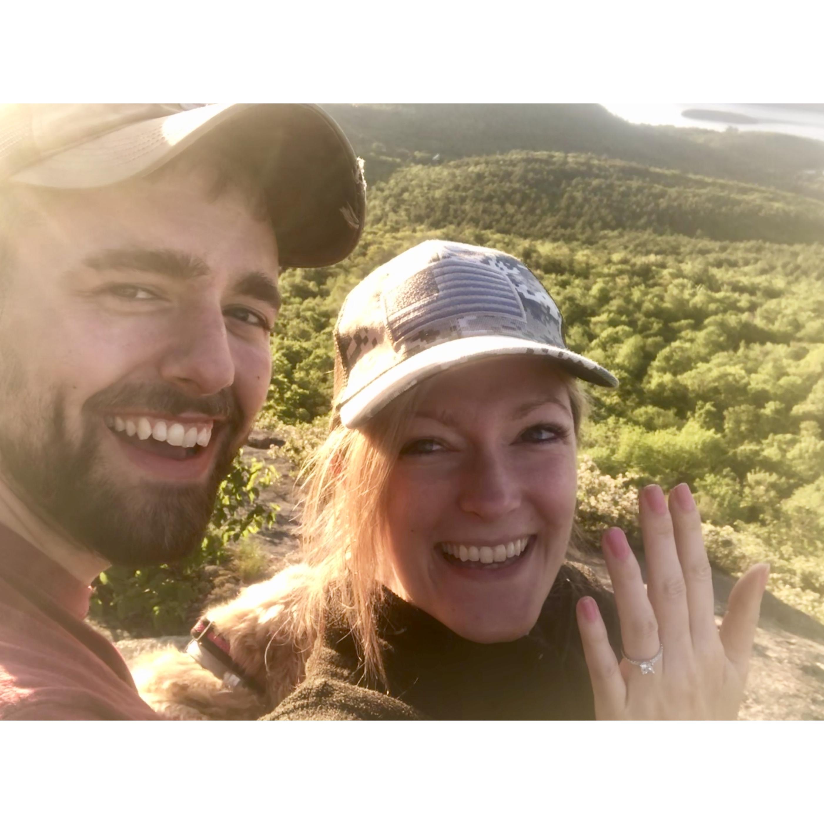 A 4am wake up on top of Cat mountain to catch the sunrise and we’re engaged!