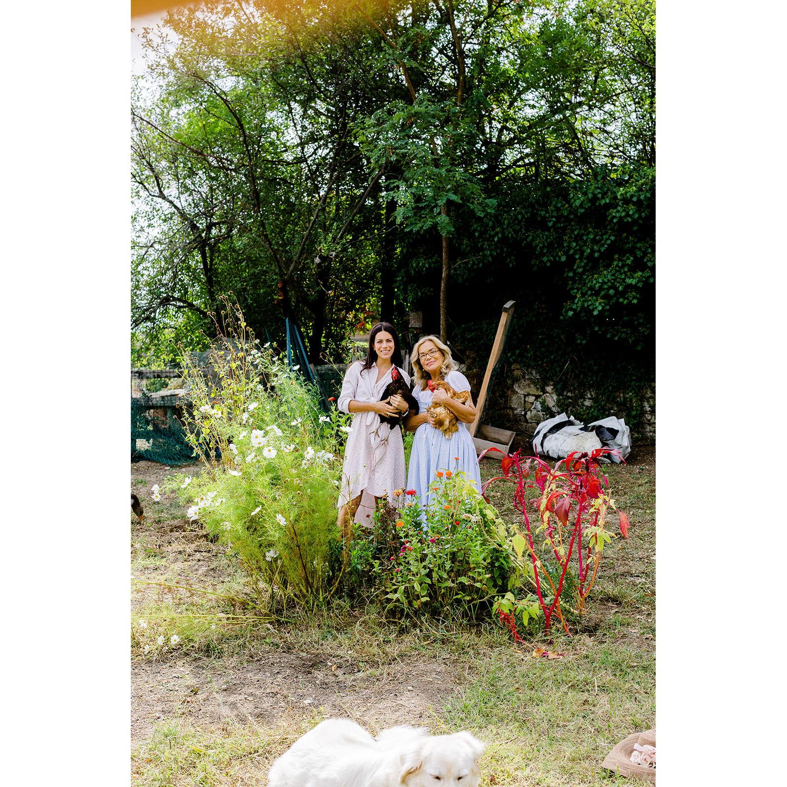 Venue owner, Lucia, and her mother along with some of the animals who live at the estate!