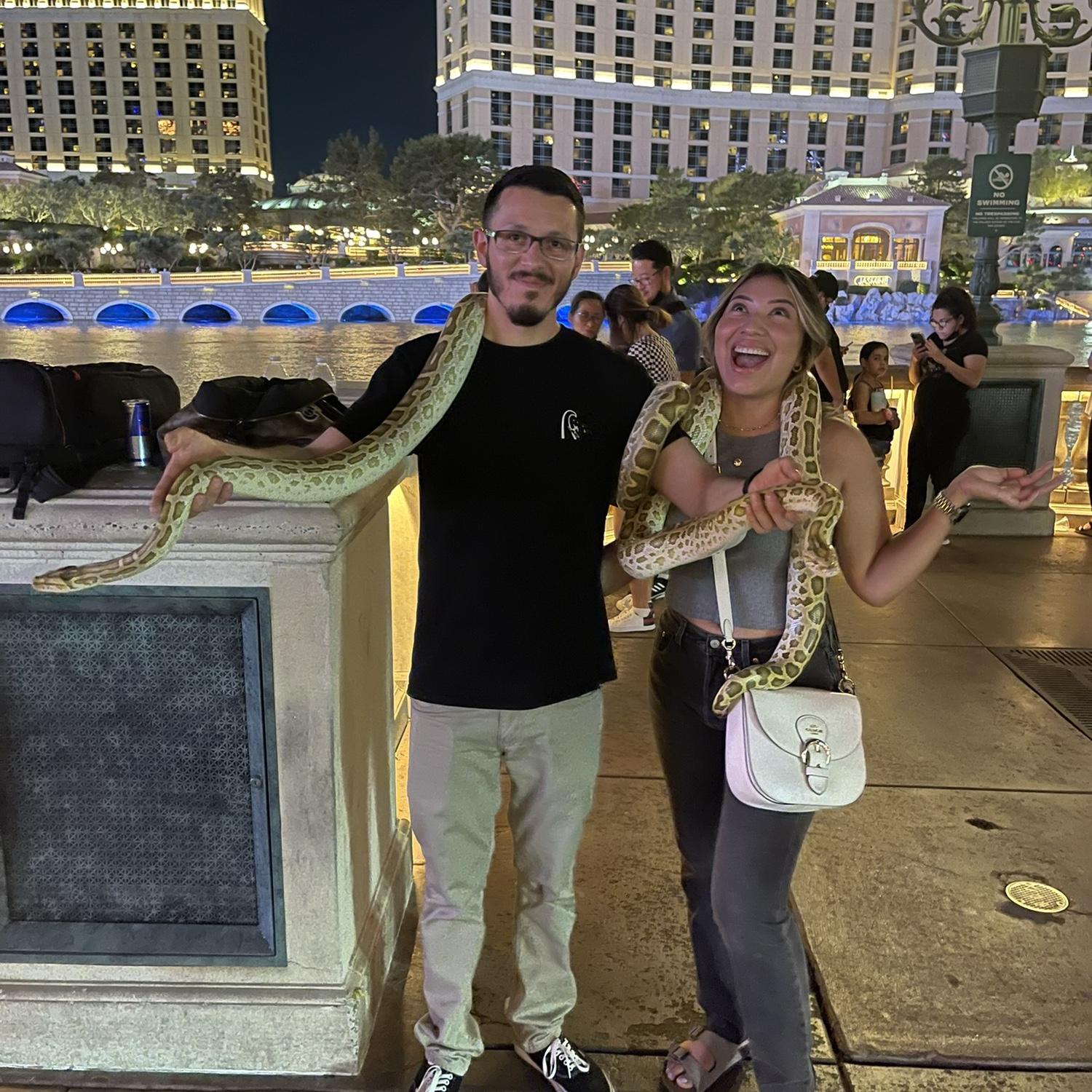 Thanks to a little alcohol in our systems this happened! We each held a snake! Terrifying experience but we can now say we held a giant snake!