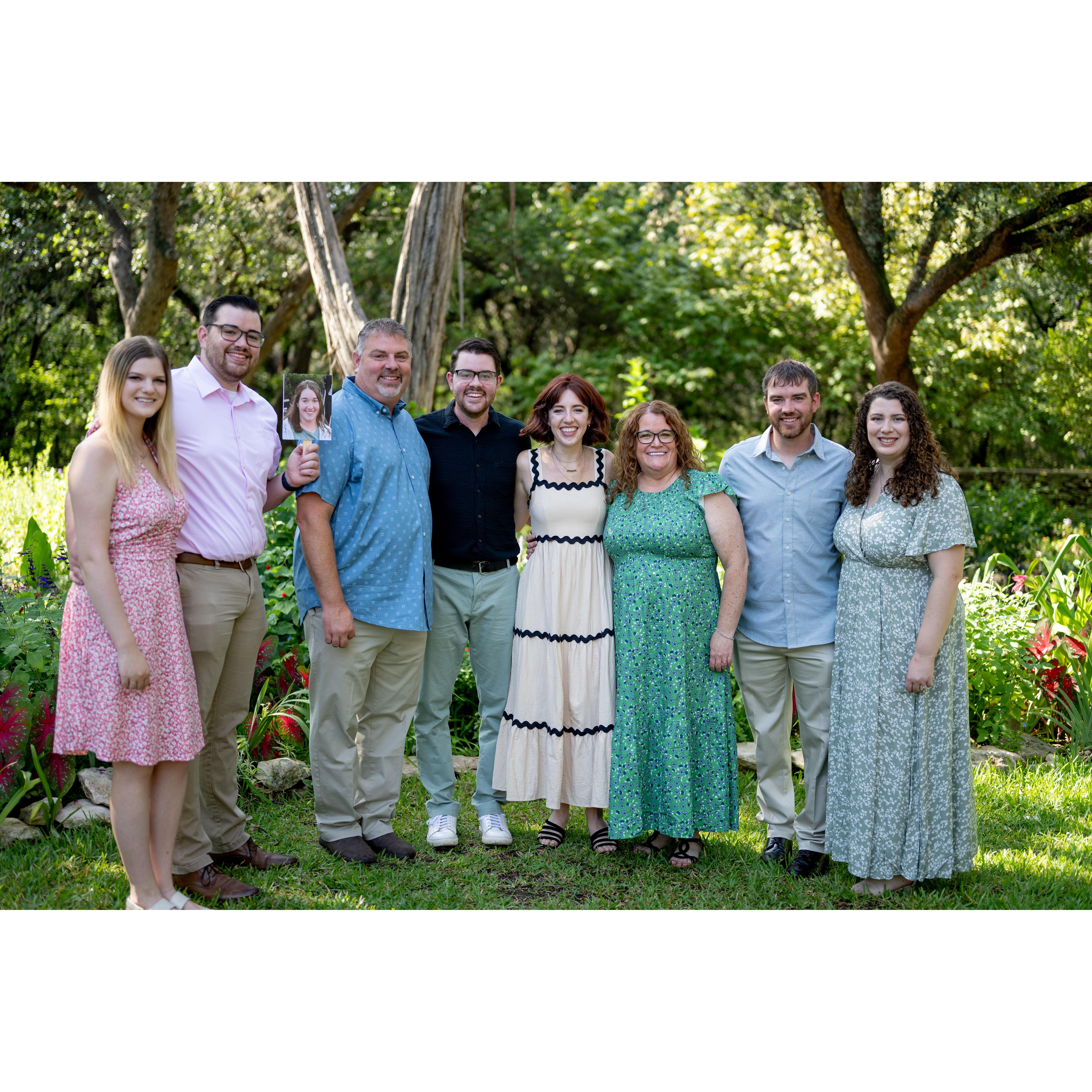 The Moniers popped out from where they were hiding just after Caroline said yes!