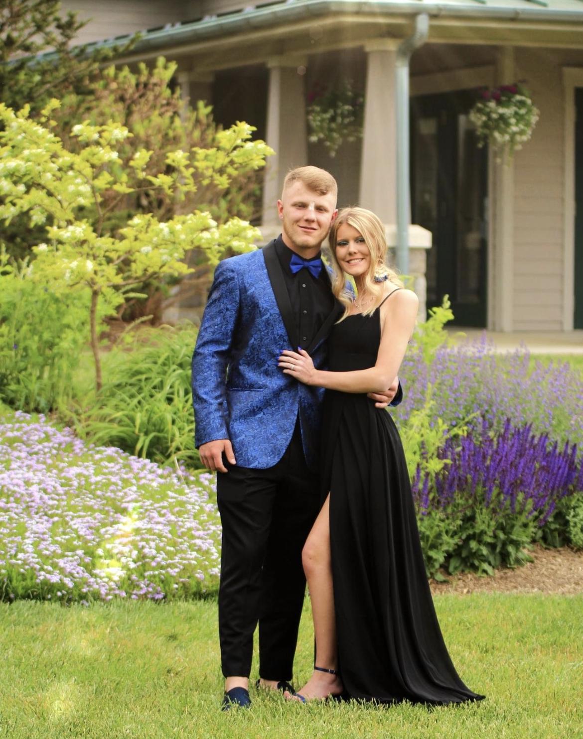 Prom senior year!! Ethan had a bandage on his knows because he dropped a weight on it the day before prom 🤦🏼‍♀️