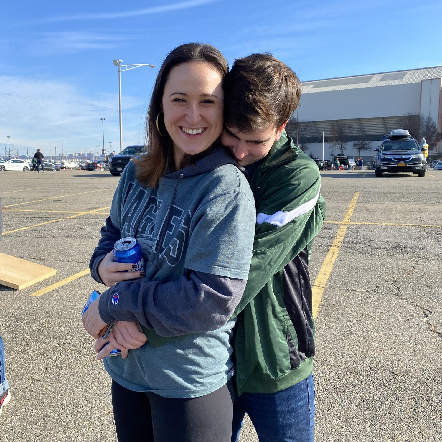 We both love football games an equal amount and no one had to be bribed with snacks to come