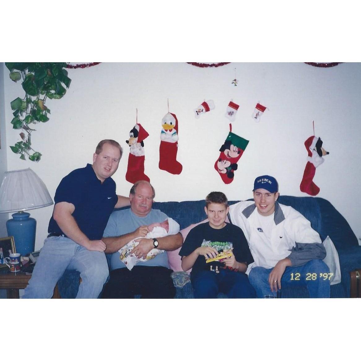 Pat, Jeff, and Sean, their dad, and Tyler Hurley (aka Shankroid), on his first Christmas. His dad, Sean, has no idea what was coming.