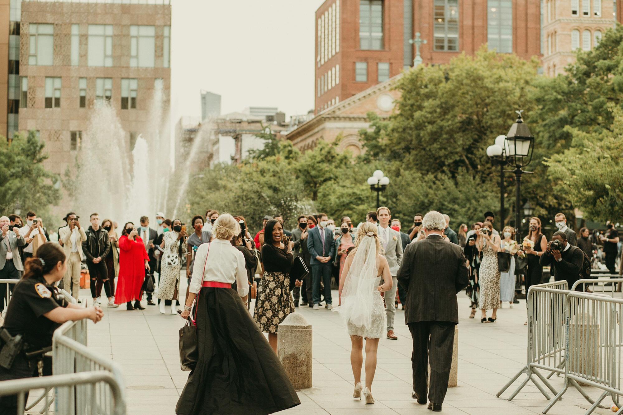 Arriving to the ceremony flanked by Mom and Dad, everyone said Rosebud walked down the aisle like she was "late for work." Pic by @Purroy_Photo_Video