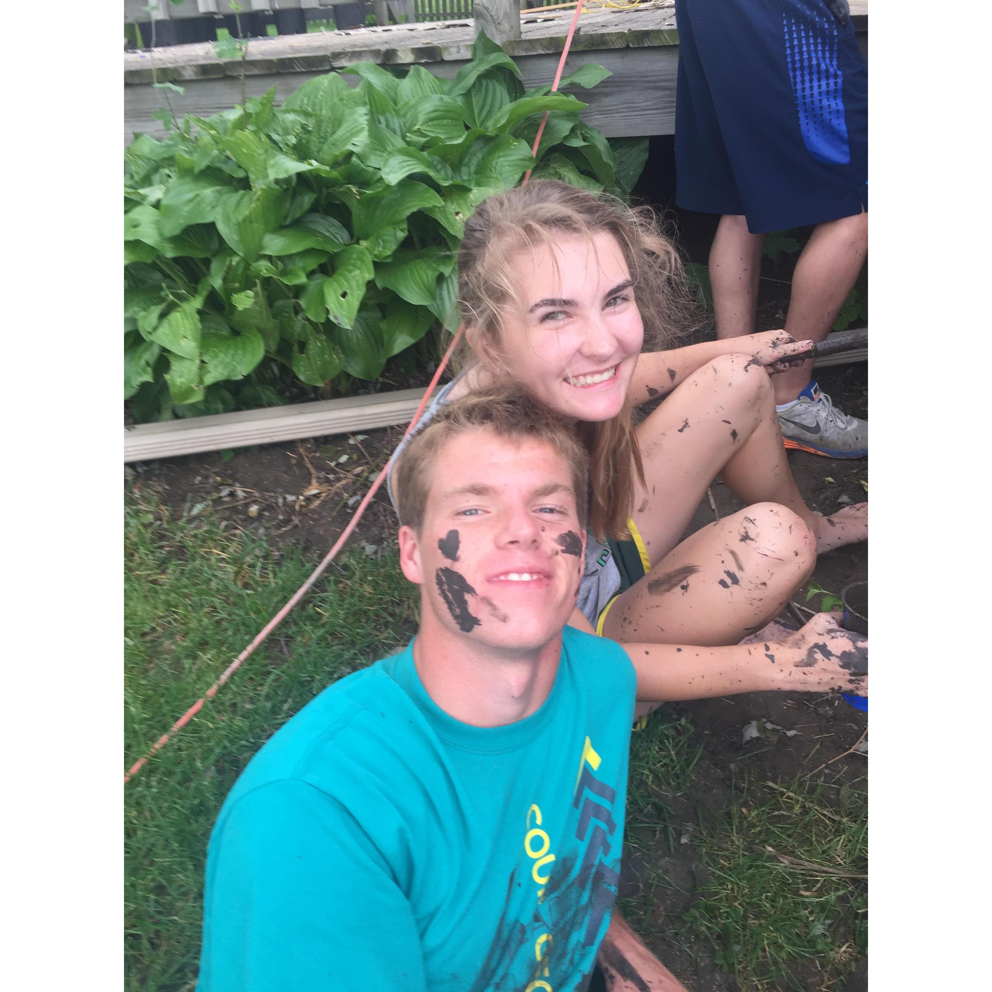 Painting fences at the Aakre's rental, when our moms first called that there was something special between us.