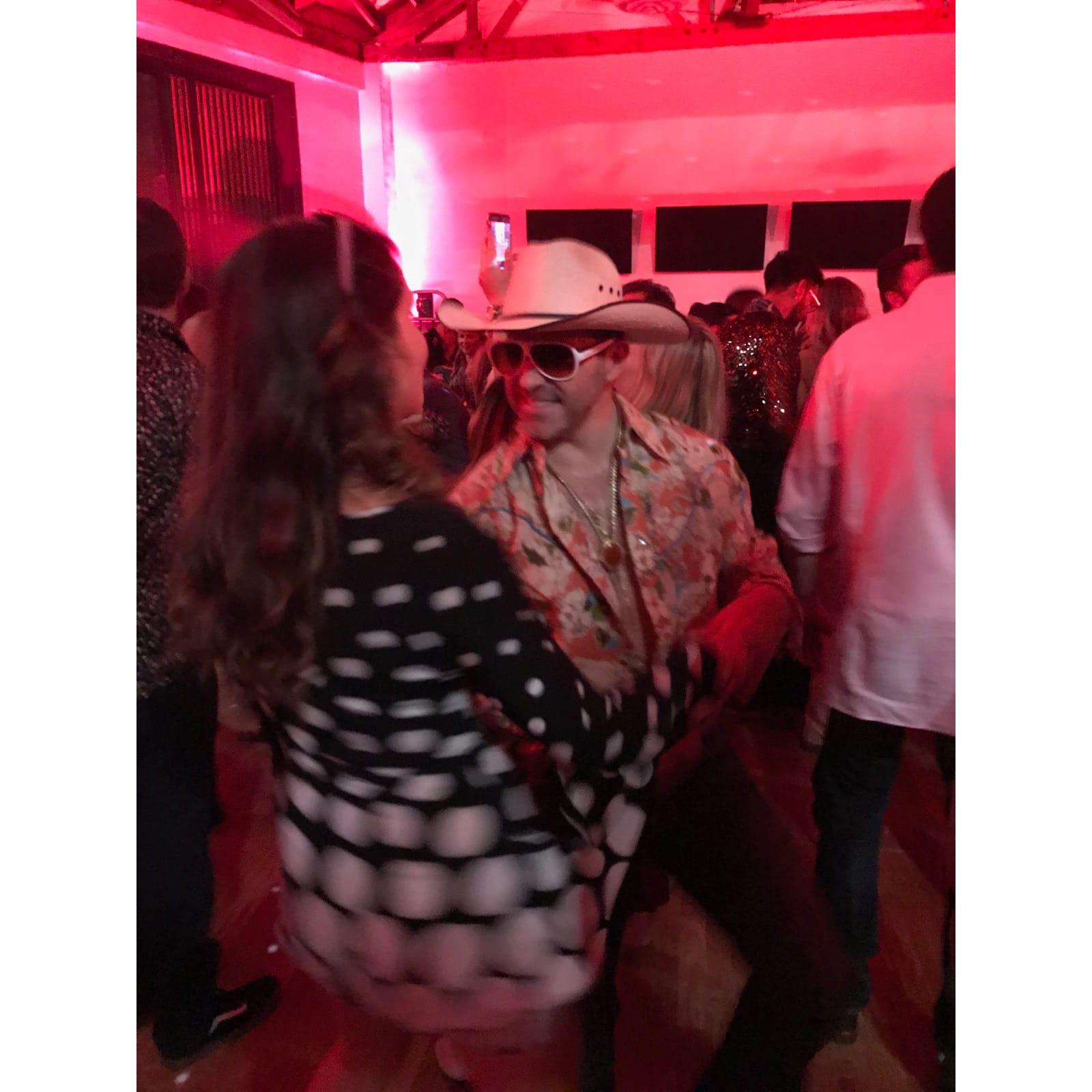 Chris stealing the show at a disco party