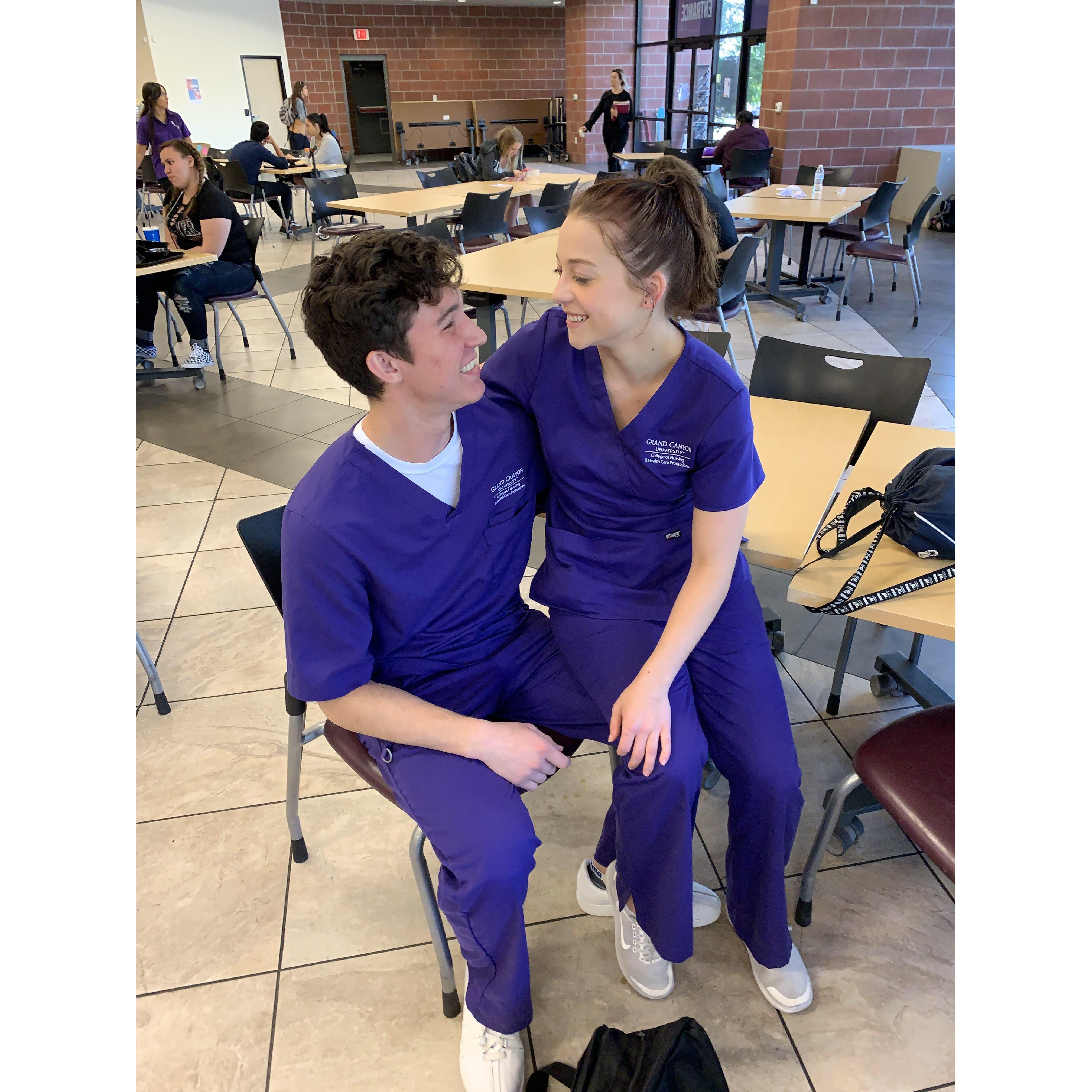 One of the few photos I have of us both in our purple scrubs