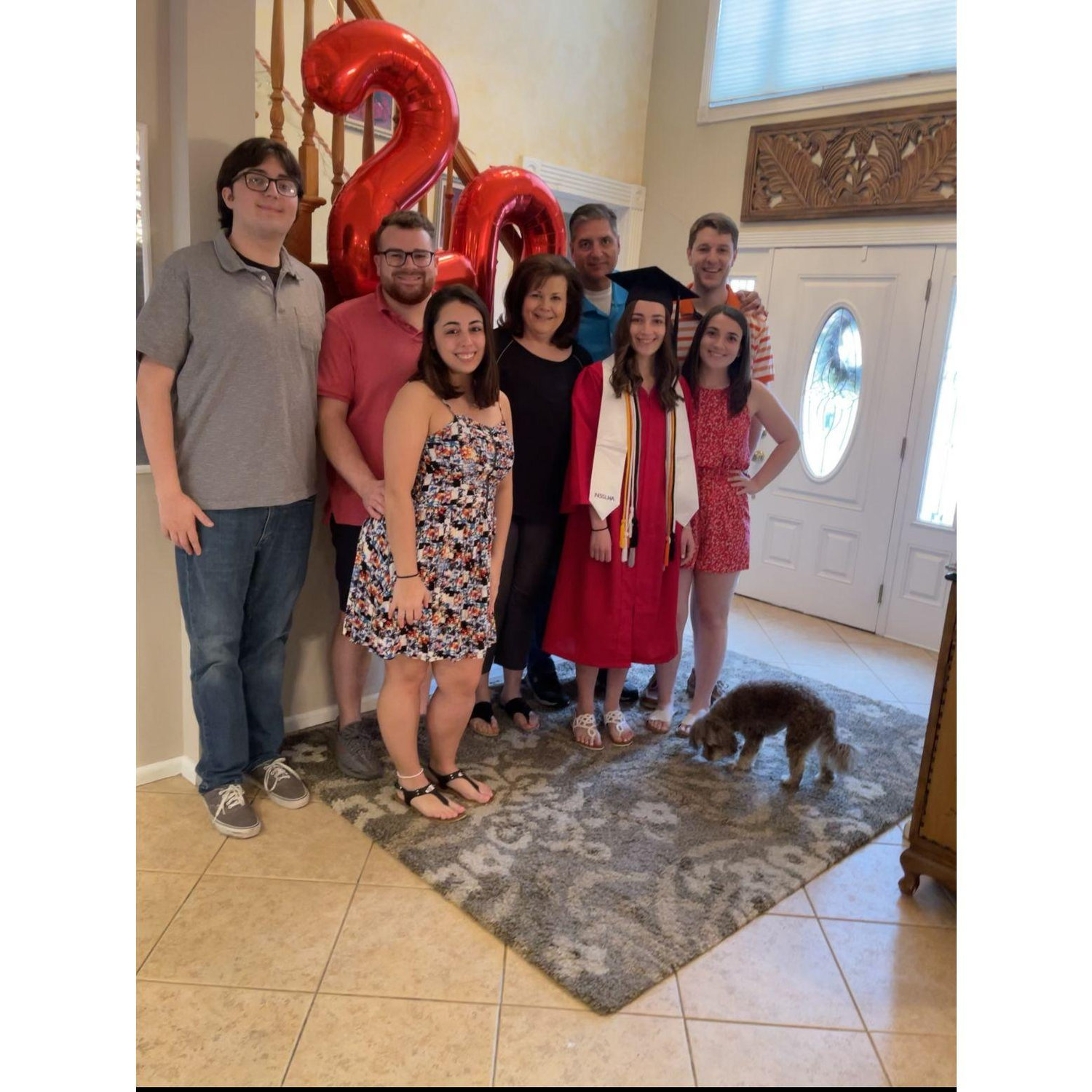 Tyler's first picture with Julia's family, taken at Catherine's undergrad graduation party (May 29, 2021)